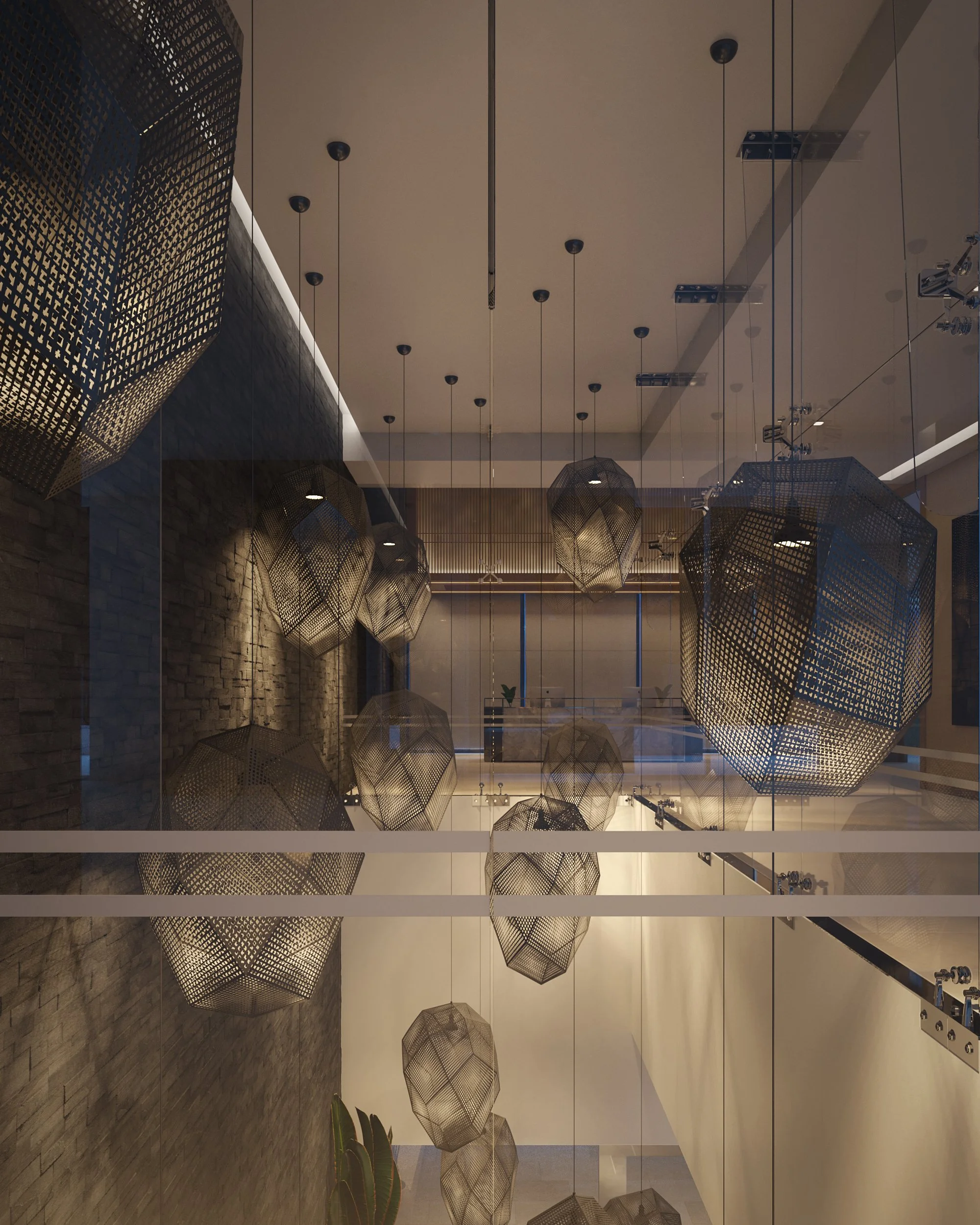 Hotel lobby interior featuring warm lighting, decorative wall panels, and soft furnishings