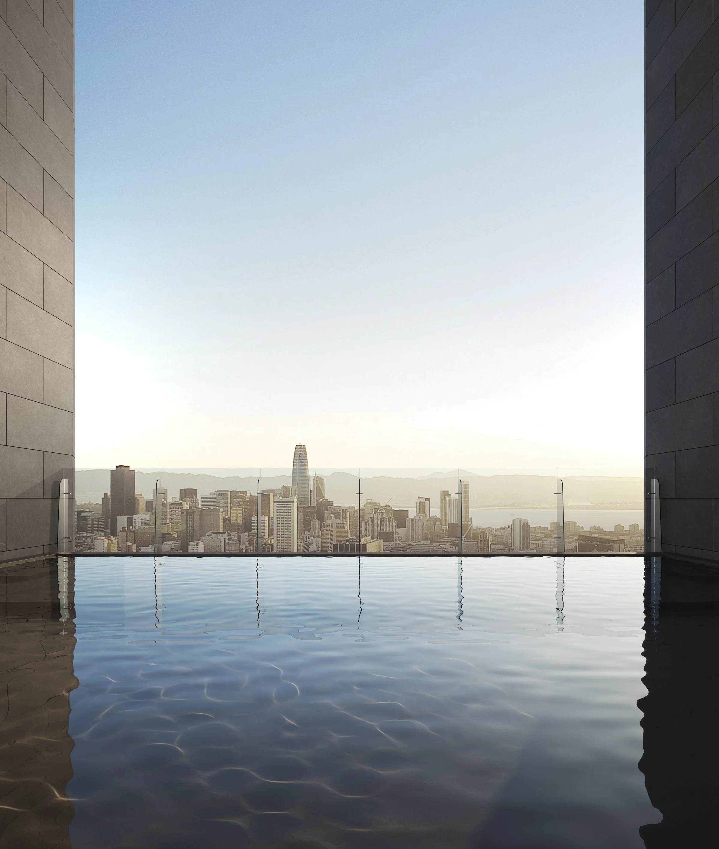 Rooftop infinity pool with panoramic city views, modern lounge area, and sunset ambiance