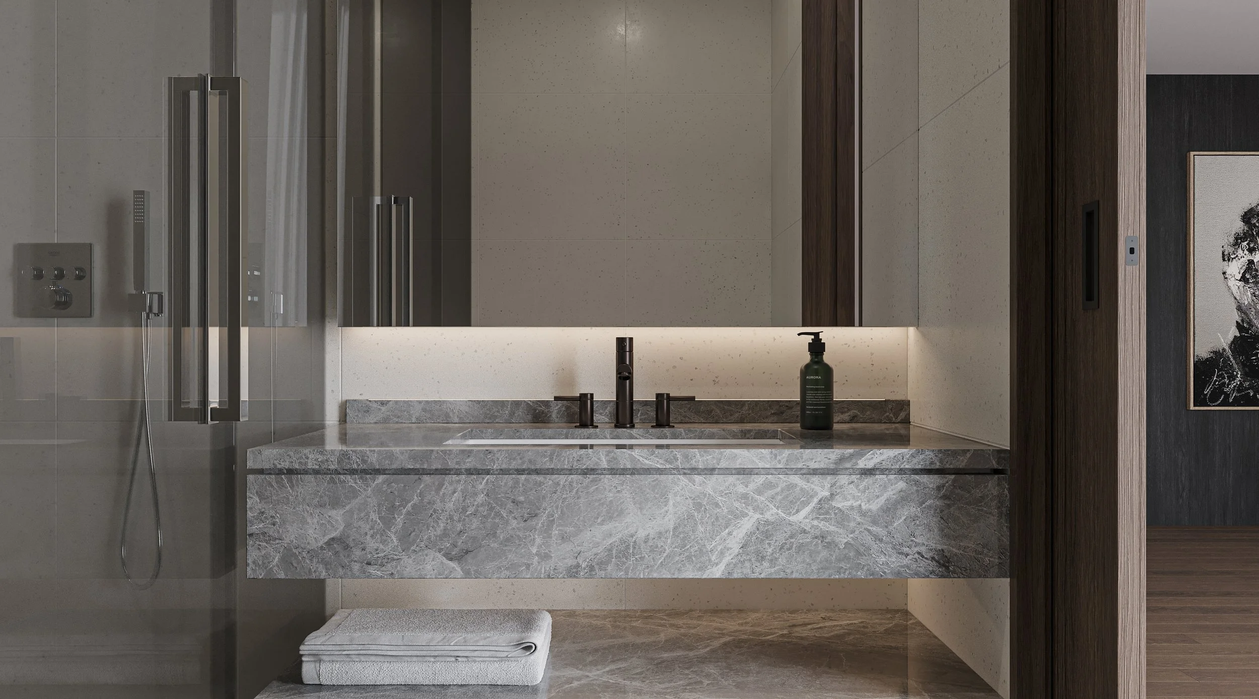 Detailed shot of ensuite with sink, mirror, and tiled wall surfaces