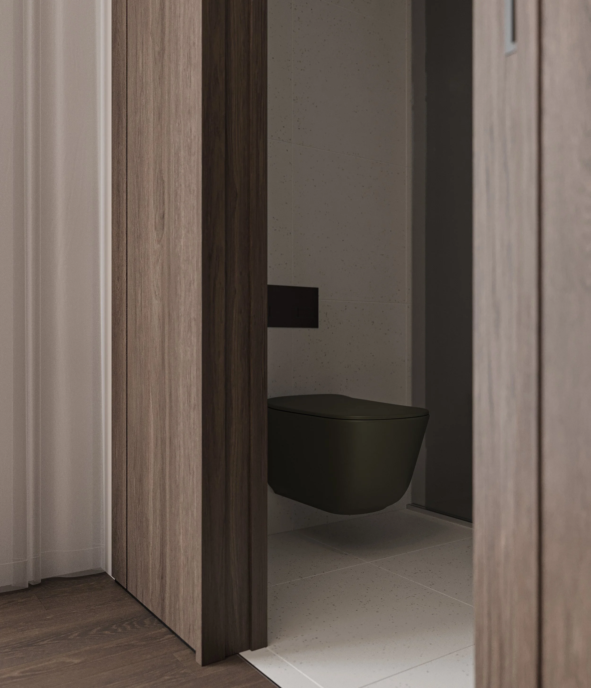 Close-up of toilet and tiled bathroom corner within ensuite space