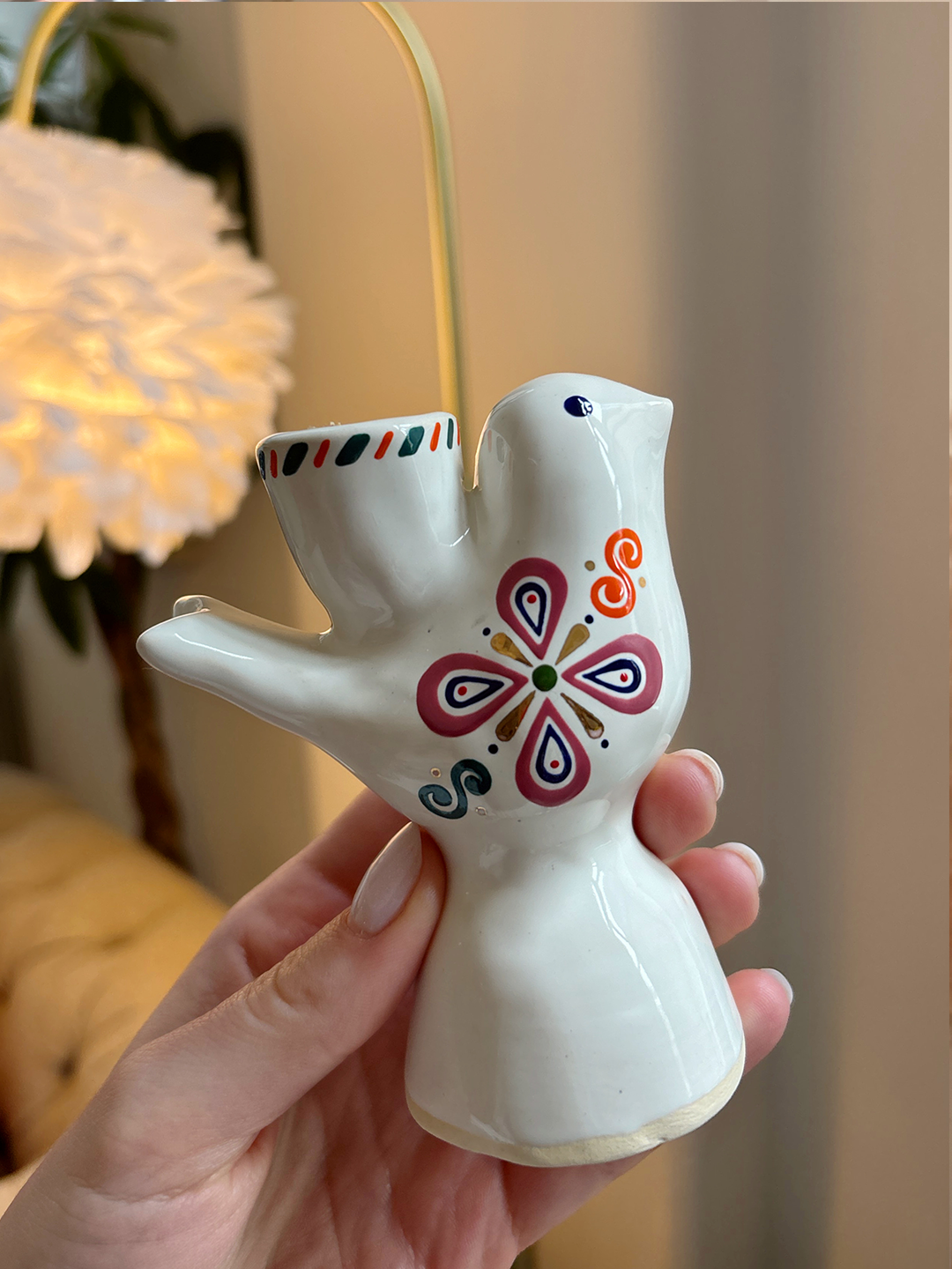 A small Easter bird candle holder.