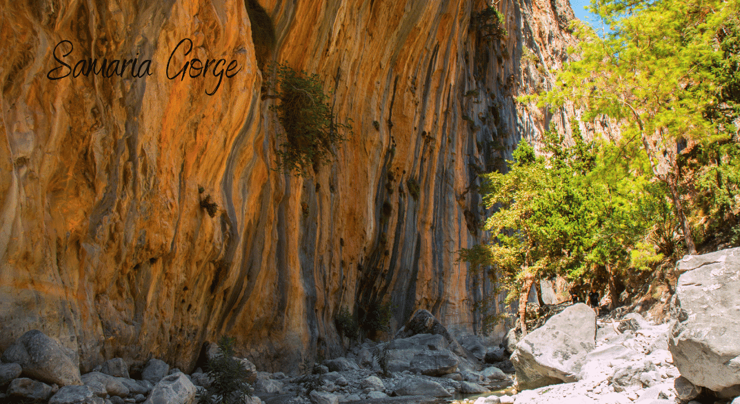 the reddish orange cliffs of samaria gorge in crete greece