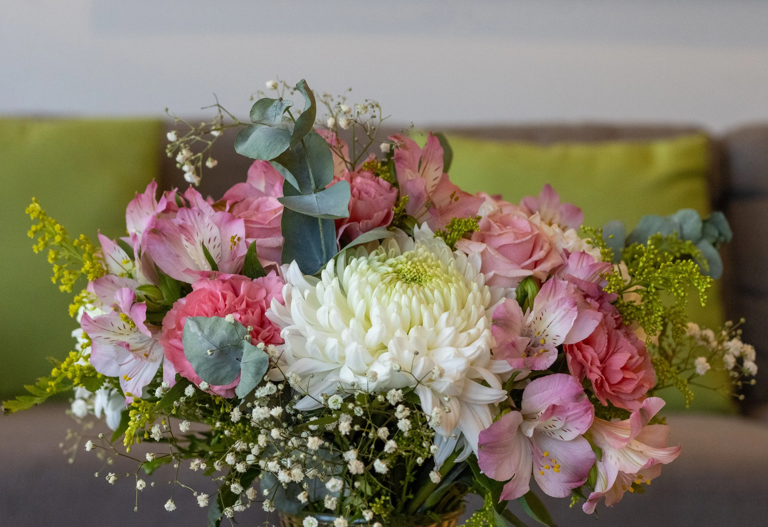 Pink, green, and white bridal bouquet