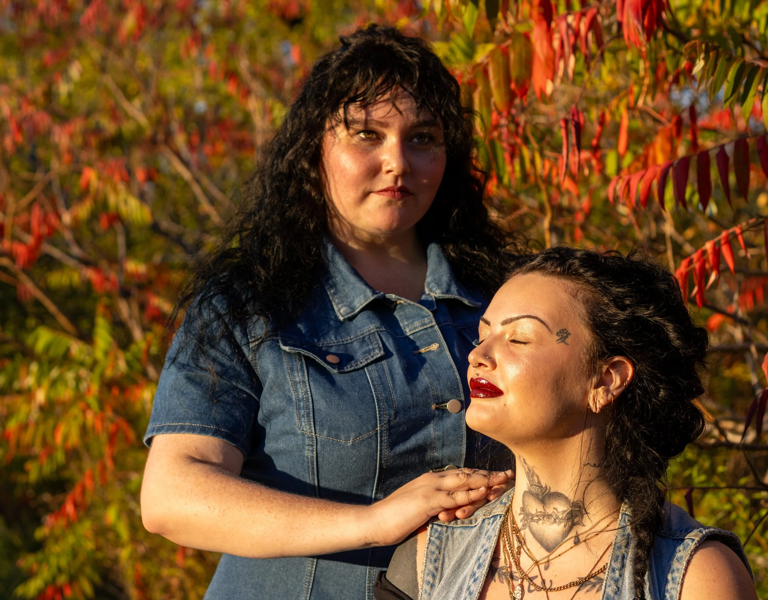 Two women standing in nature