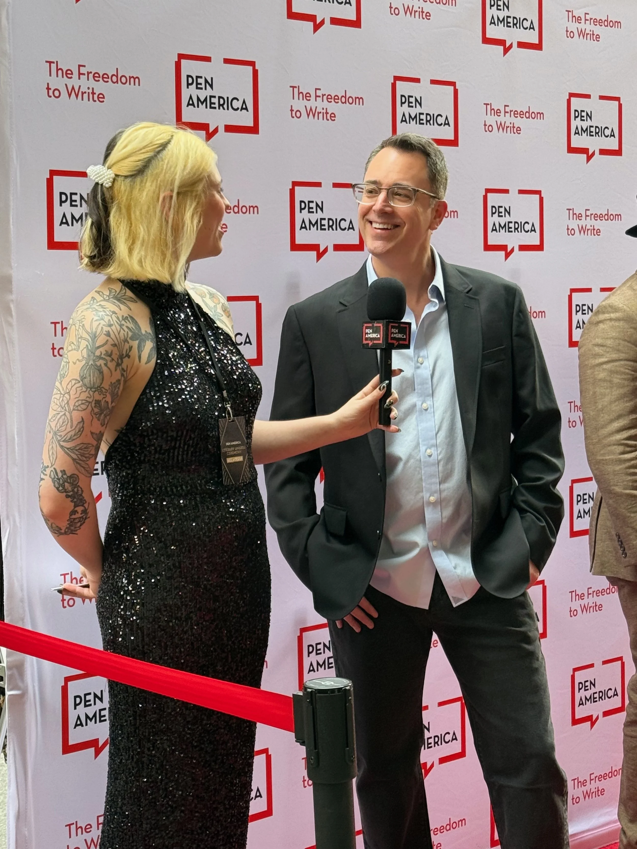 Microphone photo: Christian Moody interviewed on the red carpet at the PEN America Literary Awards