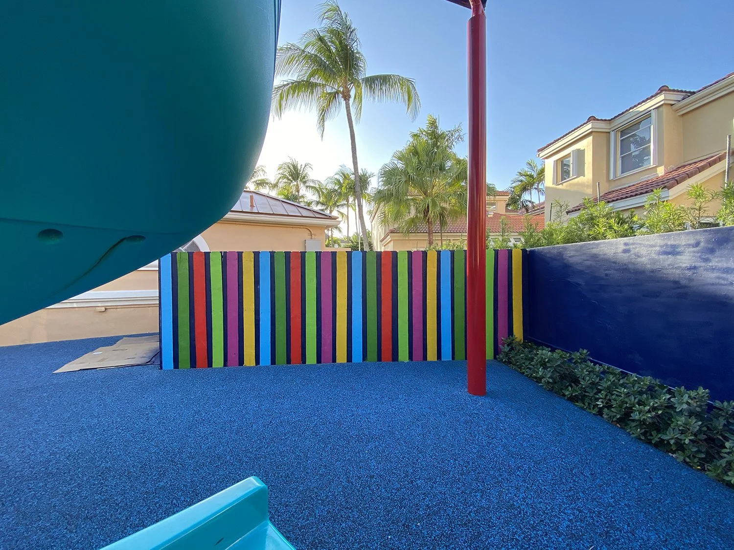 Day 2 progress Shot: Community Playground Mural in Island Way Aventura, FL. Day 1 Progress Shot (40' L x 5' H not including the fence area) 5 days to complete. Spray paint & House paint, Free Hand.