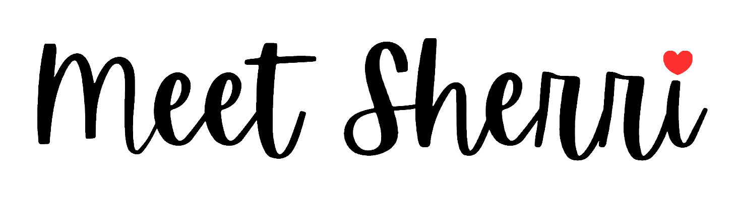The phrase 'meet, shearini' written in black cursive font with a small red heart above the letter 'i' in 'shearini'.