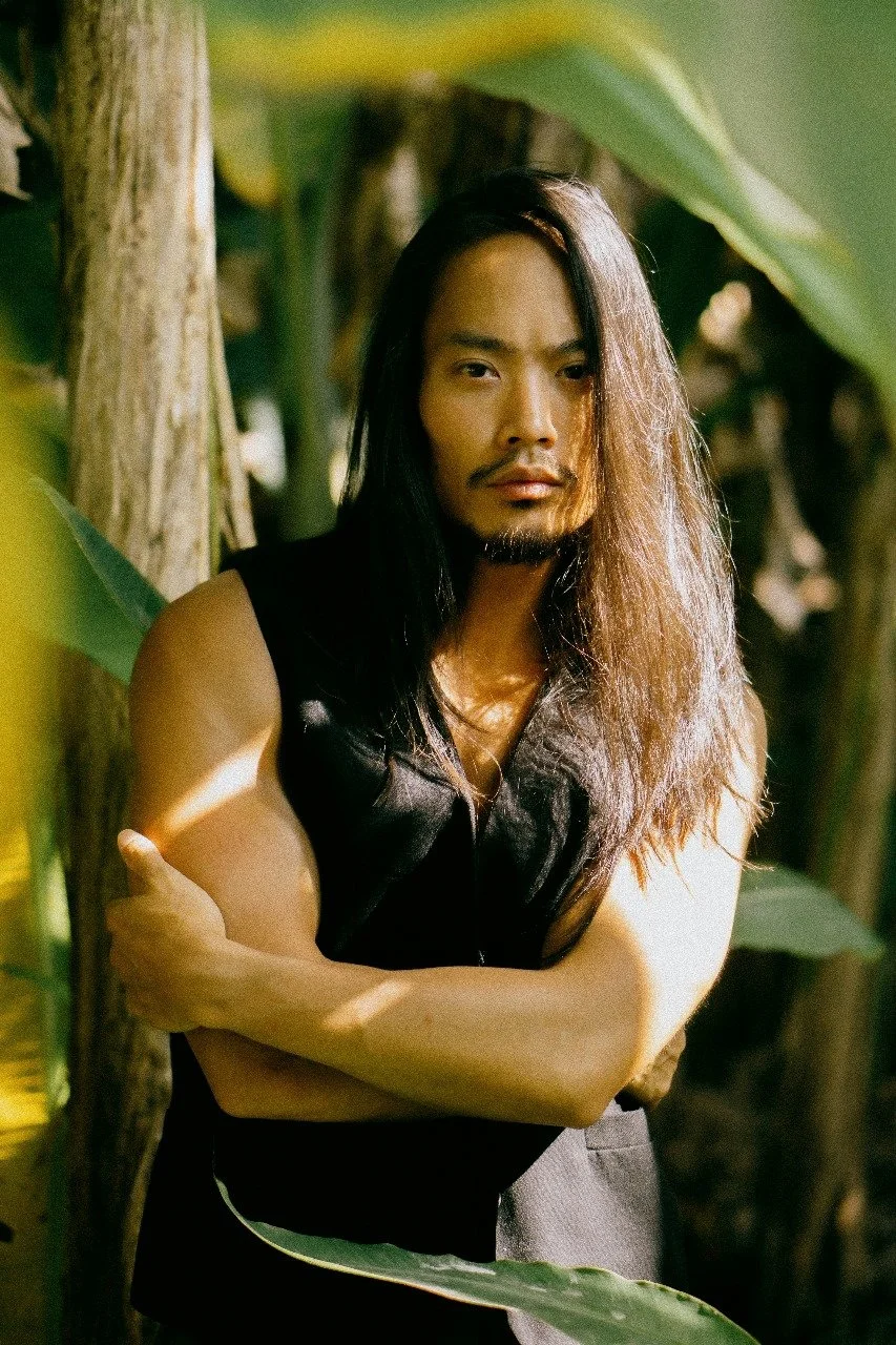 Asian Man with Long Full Hair in Tropical Settings