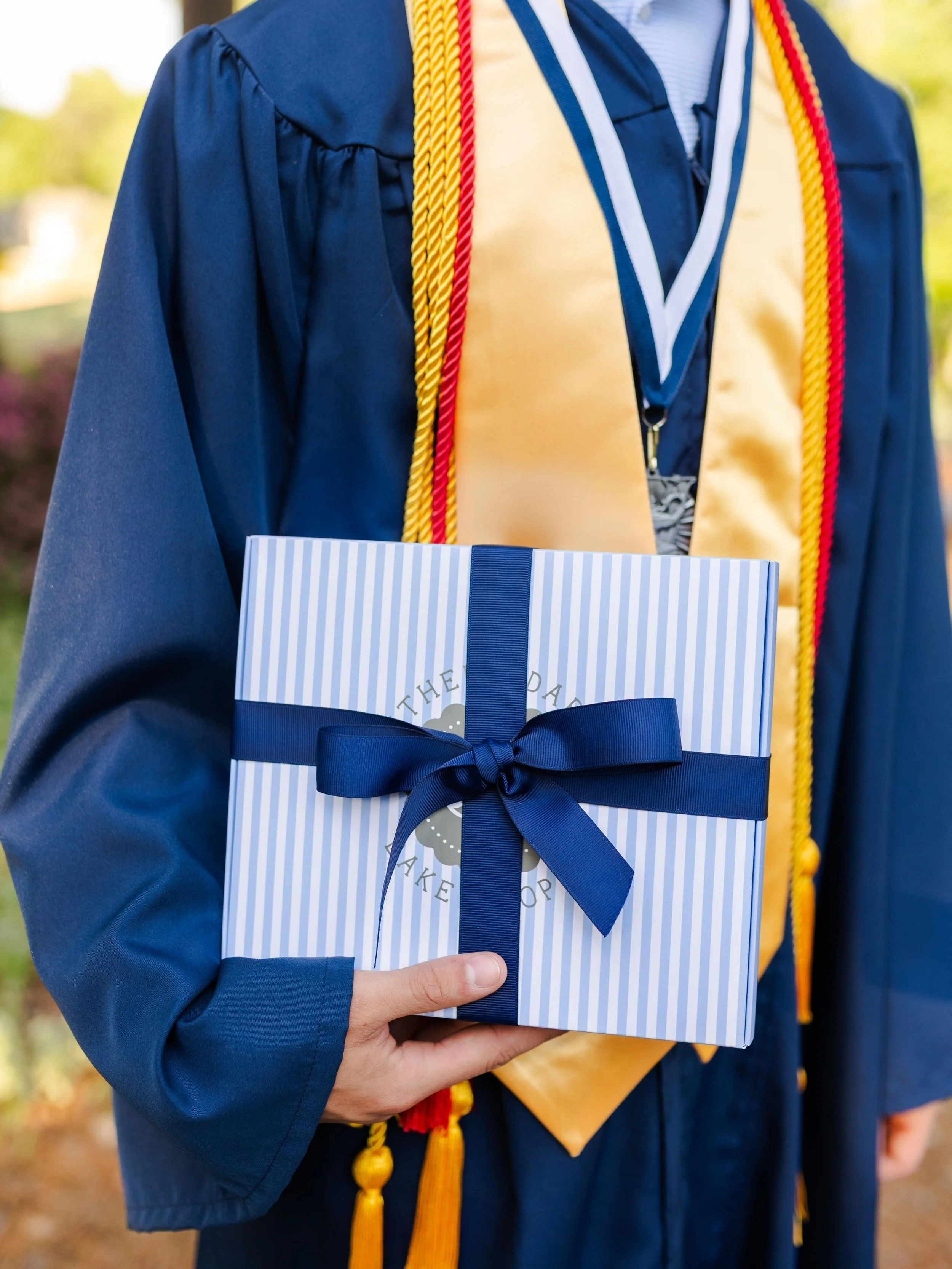 Spoil your grad with the best cookies in town! Shop our Graduation boxes and platters today! Choose your flavors, customize with school colors, and include a personalized gift message for the most meaningful gift. 🍪🎓🩵 

#southerndarlingbakeshoppe 