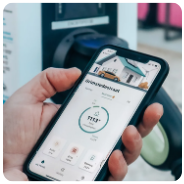 A person holding a smartphone displaying a health app with a circular progress indicator.