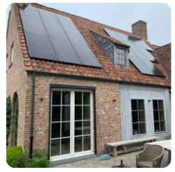 Brick house with solar panels on roof and glass sliding doors