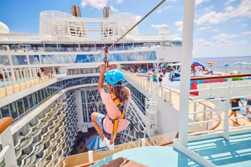 Family enjoying the zip line aboard Wonder of the Seas