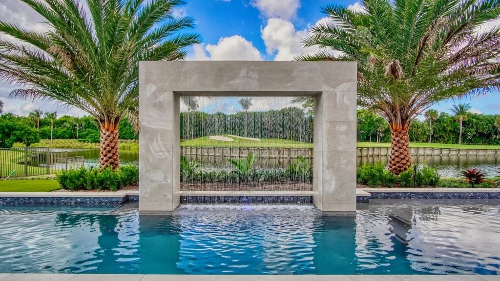 Where craftsmanship meets innovation. ✨
This @bocaraton masterpiece redefines backyard luxury — featuring a stunning architectural waterfall that blends art, sound, and movement into one seamless design.
From the precision stonework to the sere