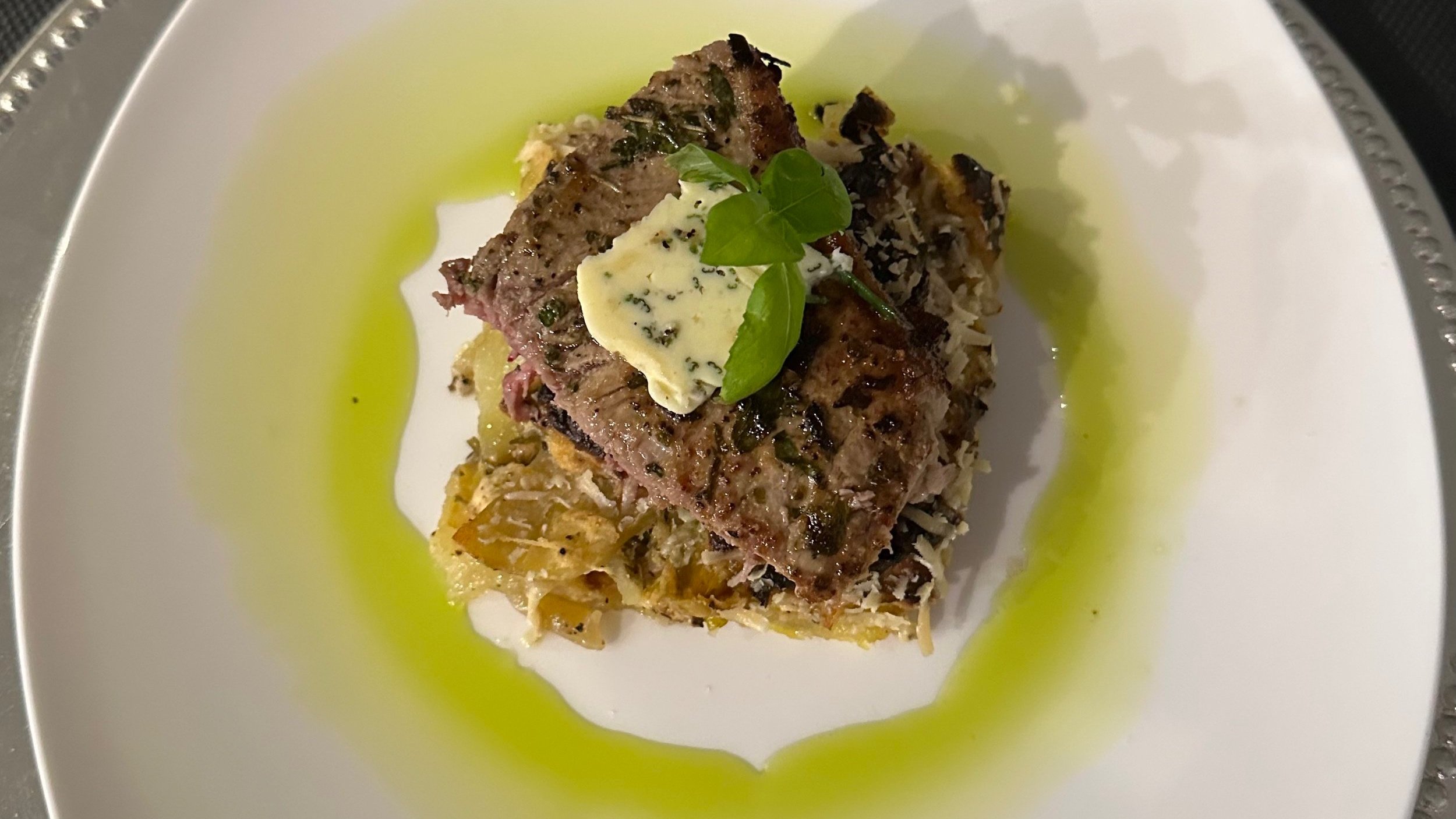 VEAL CHOP OVER POTATO-LEAK GALETTE