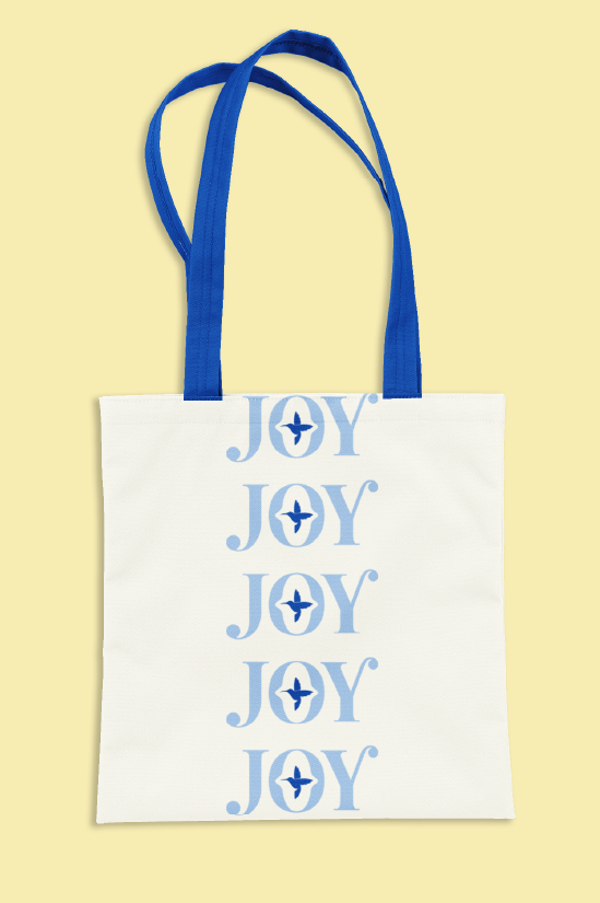 White tote bag with blue handles and the word "JOY" printed vertically five times in light blue.