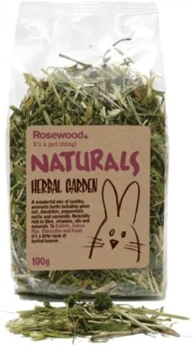 A clear plastic bag containing dried herbs labeled 'Rosewood Naturals Herbal Garden' with a rabbit illustration, and some dried herbs spilled out in front.