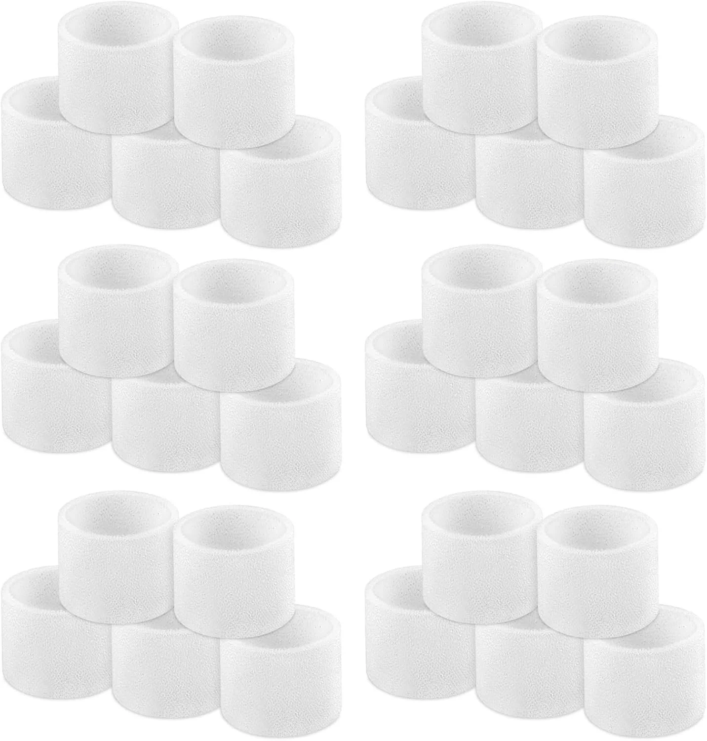 A repeating pattern of white foam rolls, arranged in a pyramid shape.
