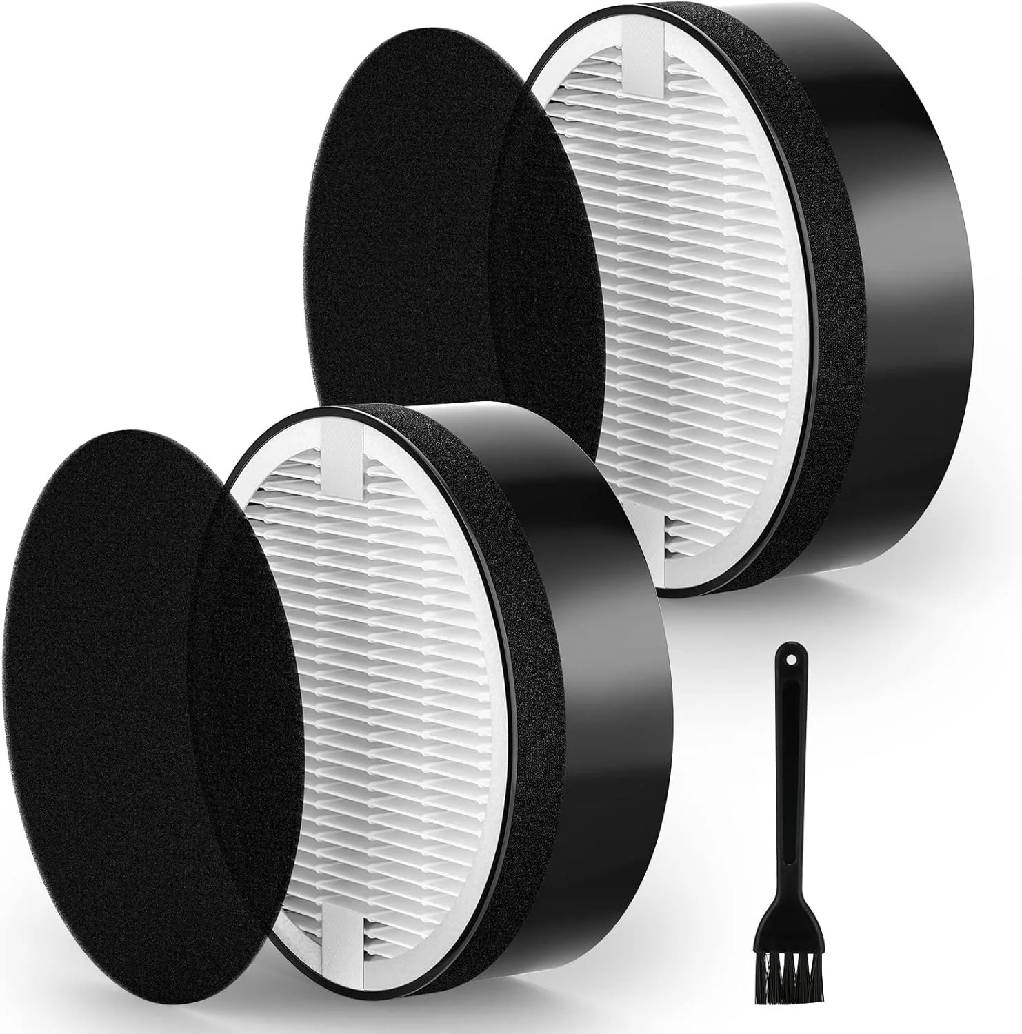 Two circular vacuum cleaner filters with a small black brush in front of them.