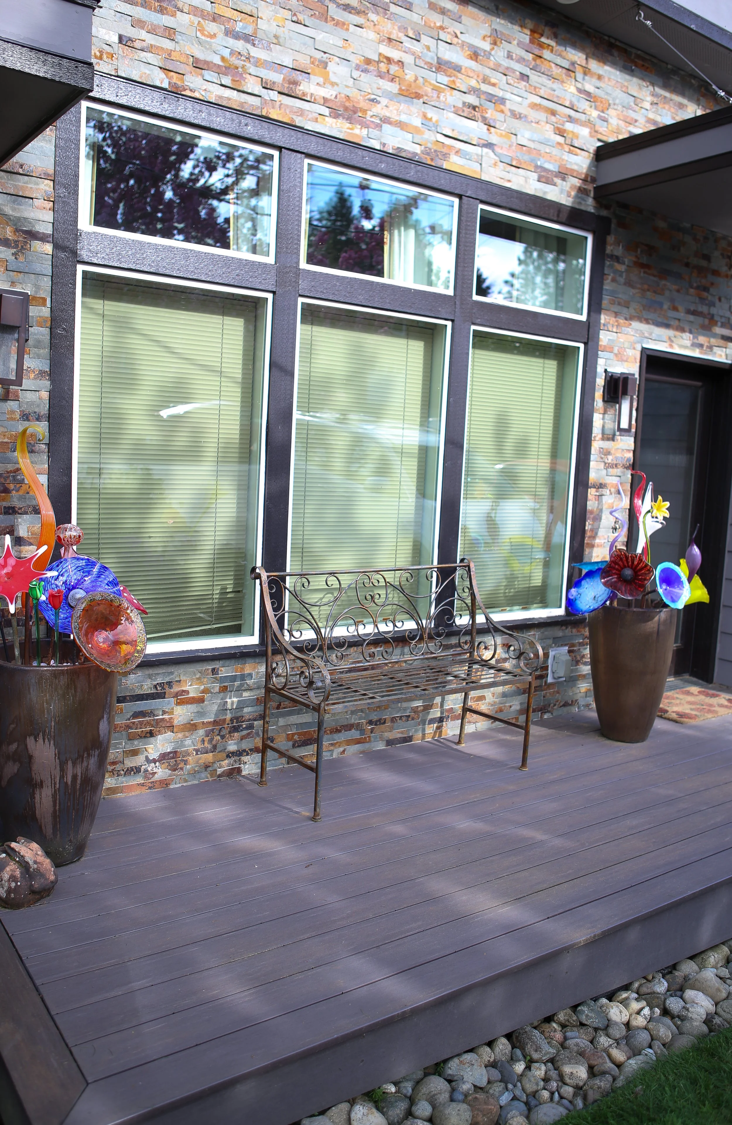 Installation of Trex, siding, windows, trim, etc. This whole area is an extension of the home that I built.