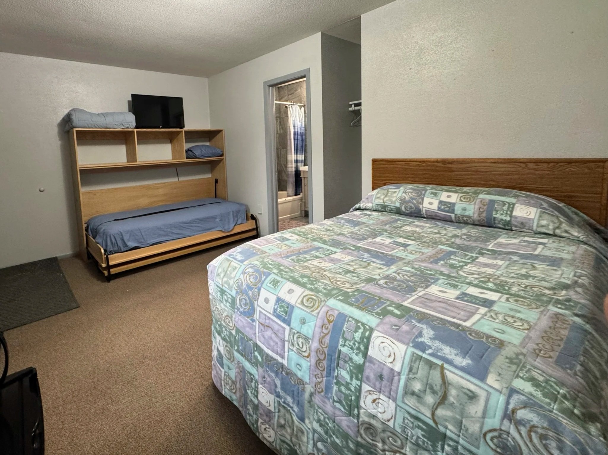 Full-Size room with Desk that fold down into twin-size Murphy bed. Microwave, Mini-Fridge, Smart TV with over 200 channels and coded locks for easy entry and self-checkin if necessary.