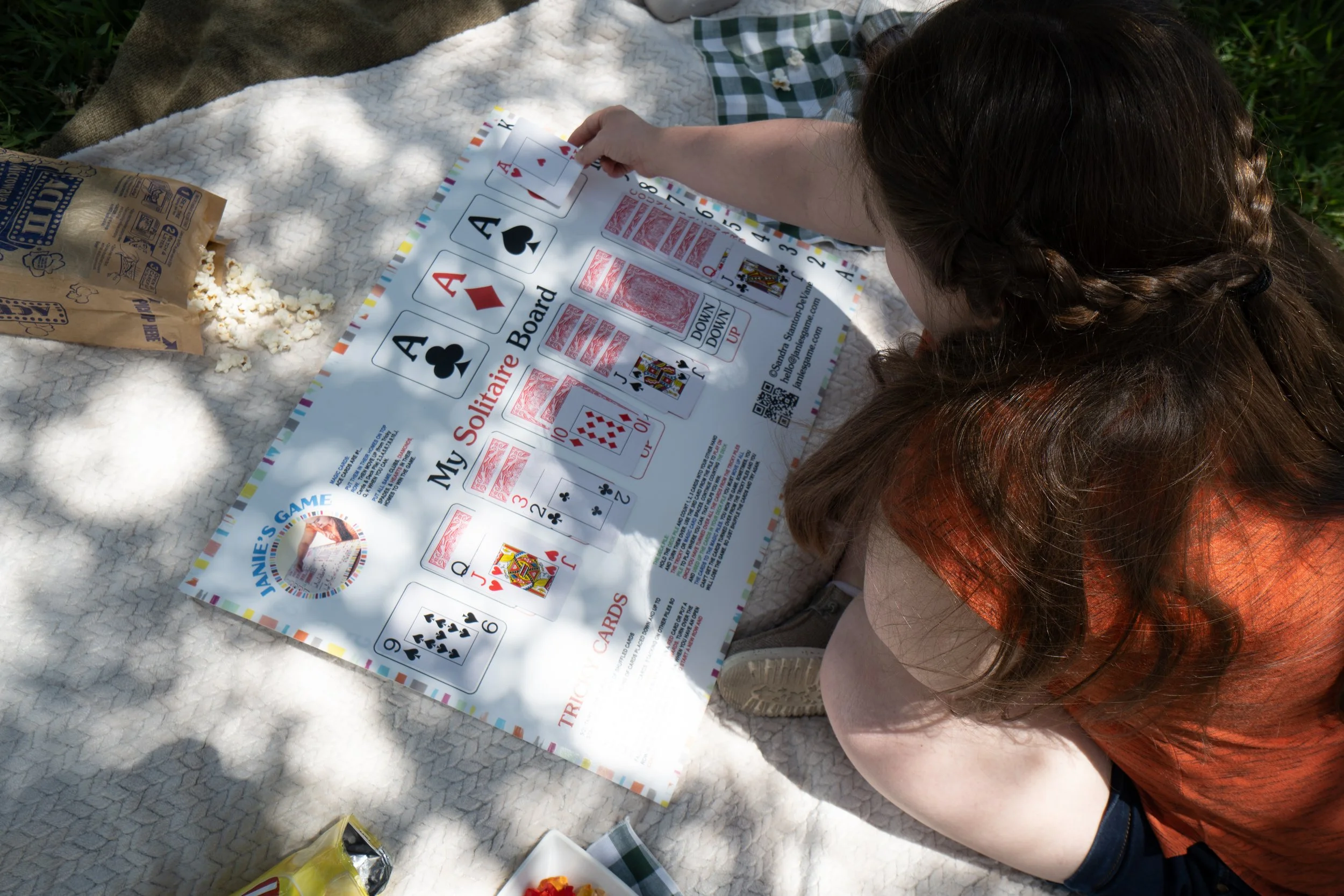 Janie's Game, accessible Solitaire board designed for individuals with Down syndrome, autism, seniors, and caregivers.