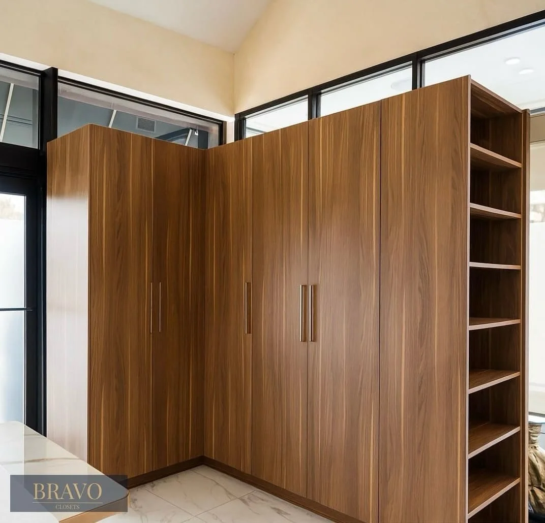 Elegance meets functionality at @samsristorante_ 
This custom-built wardrobe by Bravo Closets blends modern design with rich wood tones &mdash; adding warmth, sophistication, and seamless storage to the restaurant&rsquo;s private space. ✨

Sam&rsquo;