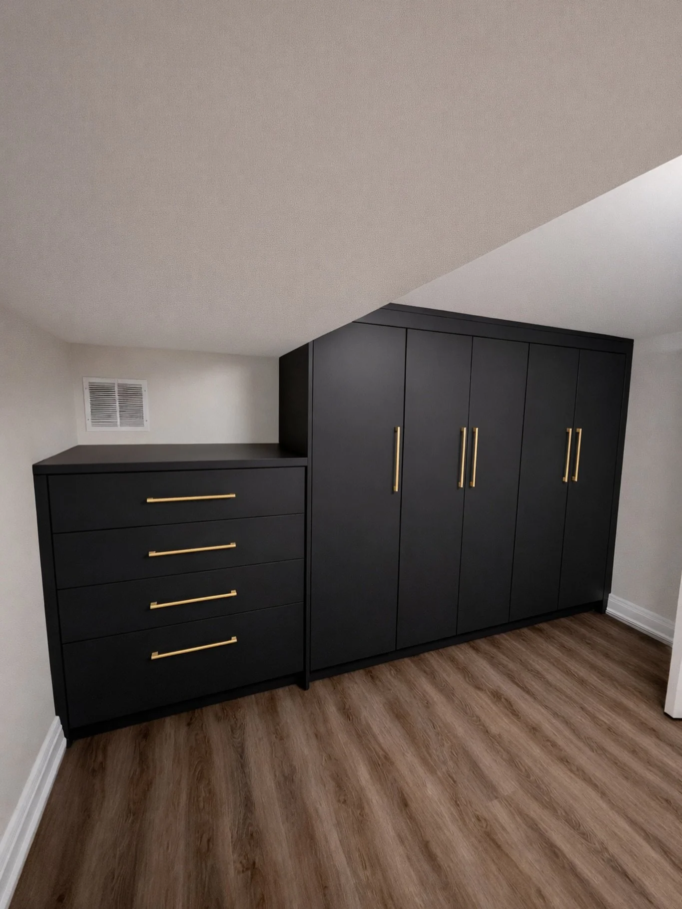Bold. Refined. Unapologetically modern.

This custom soft-touch black wardrobe brings luxury and function together in one sleek design. Finished with elegant gold hardware, it&rsquo;s the perfect balance of sophistication and statement. Designed to f