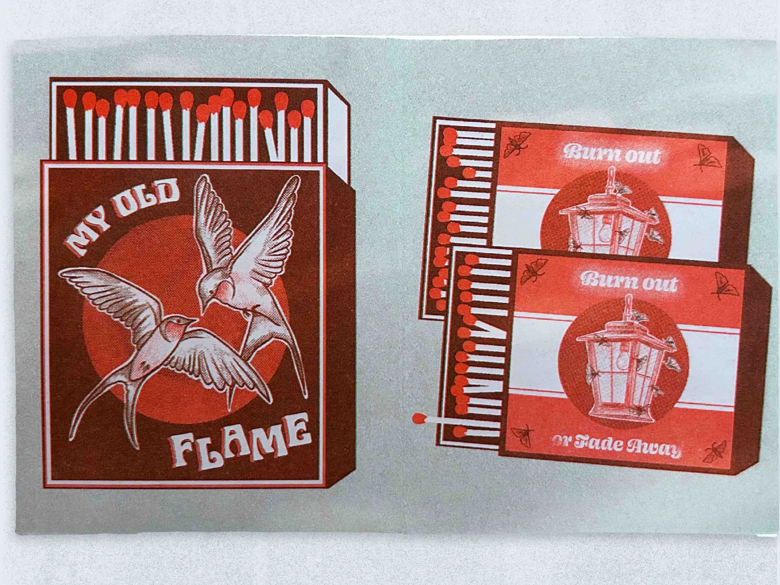 A box of matches with a design of three flying birds in front of a red circle and the words "My Old Flame," along with two another matchbooks labeled "Burn Out" and "W Faded Away" with images of a vintage lantern.