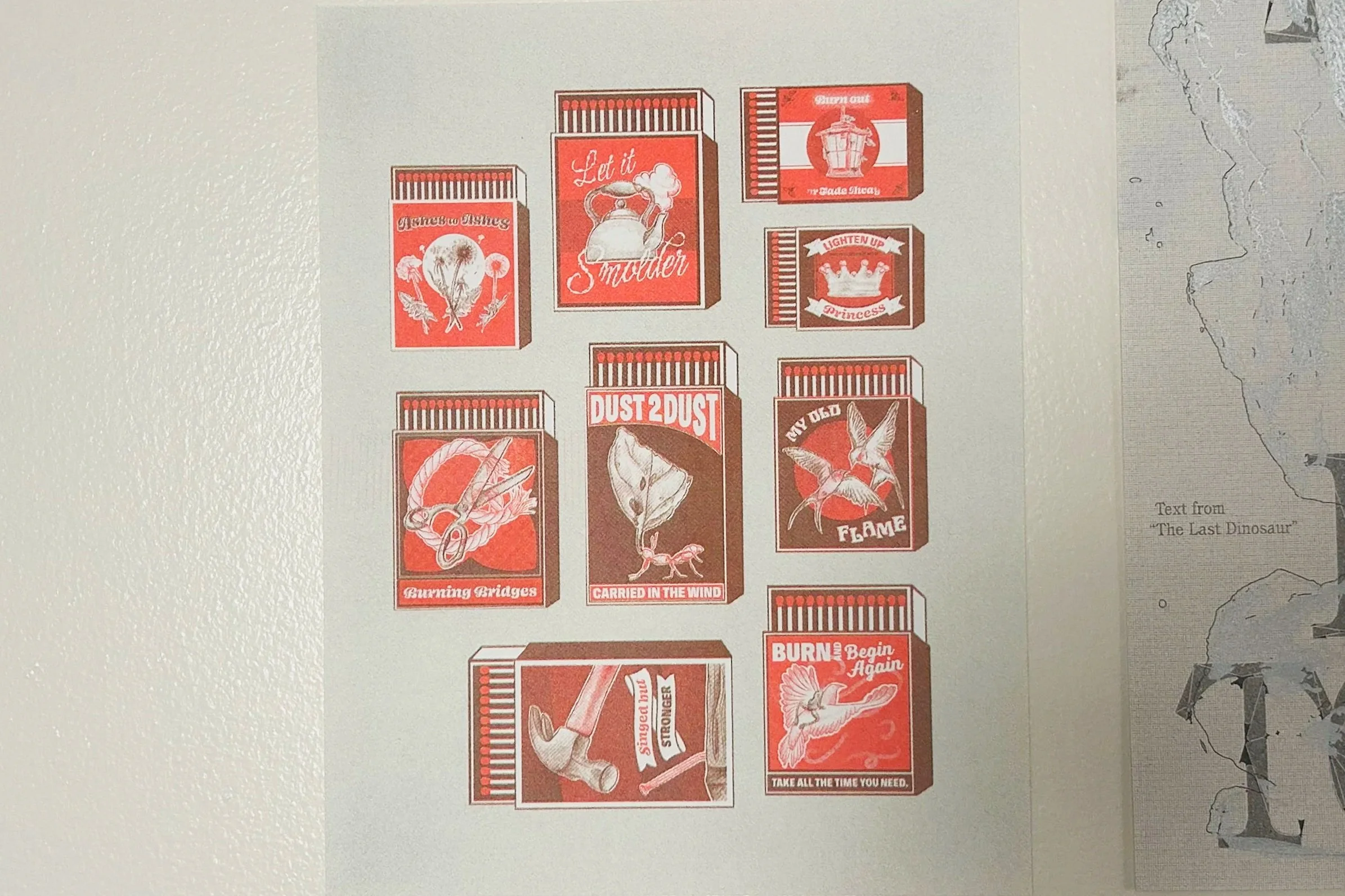 Illustration of matchboxes with vintage-style labels and slogans, including images of birds, a teapot, and a knife and fork, with captions like 'Let it Smoulder', 'Dust 2 Dust', and 'Burn & Begin Again'.