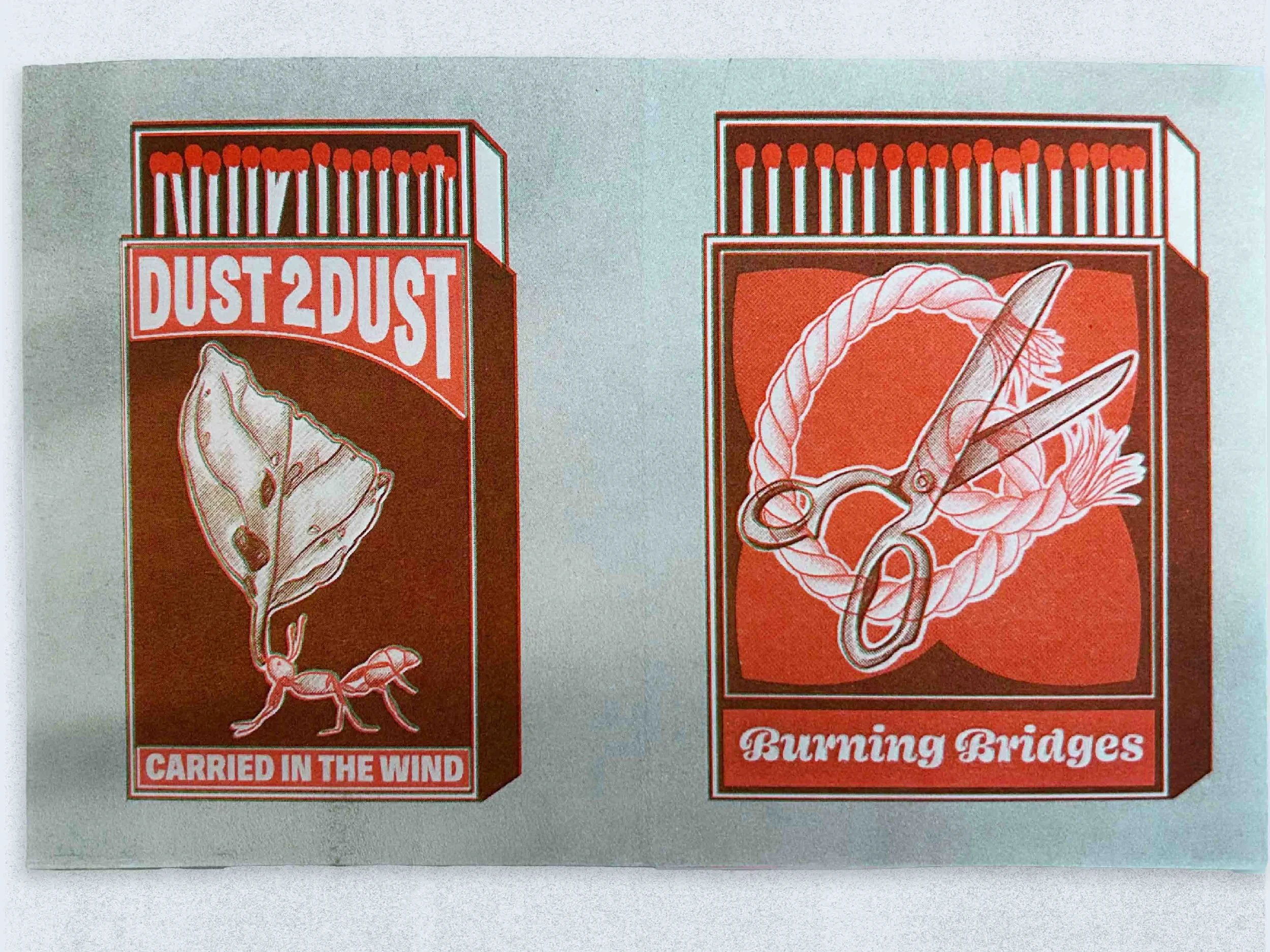 Two vintage matchbook covers. The left matchbook shows a mouse carrying a leaf with the text 'Dust 2 Dust' and 'Carried in the Wind.' The right matchbook displays a pair of scissors cutting a rope with a flame, with the text 'Burning Bridges.'