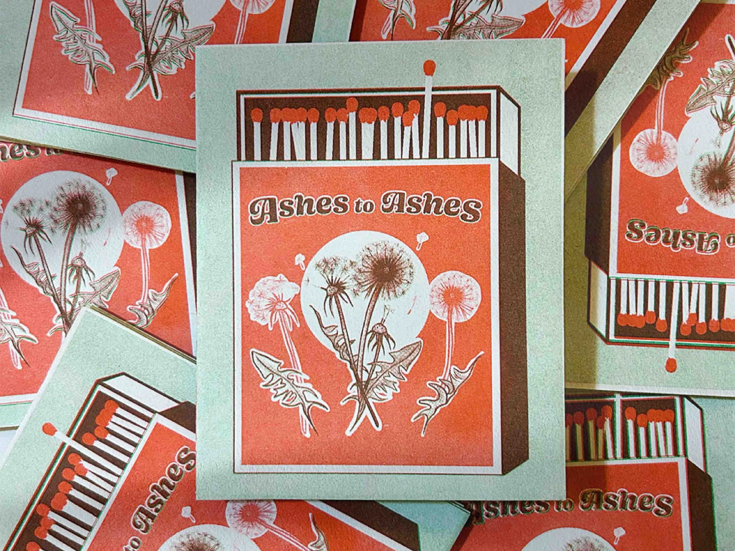 A stack of condolence cards with the text 'Ashes to Ashes' and a graphic of dandelions and a piano. The background is a vivid orange color.