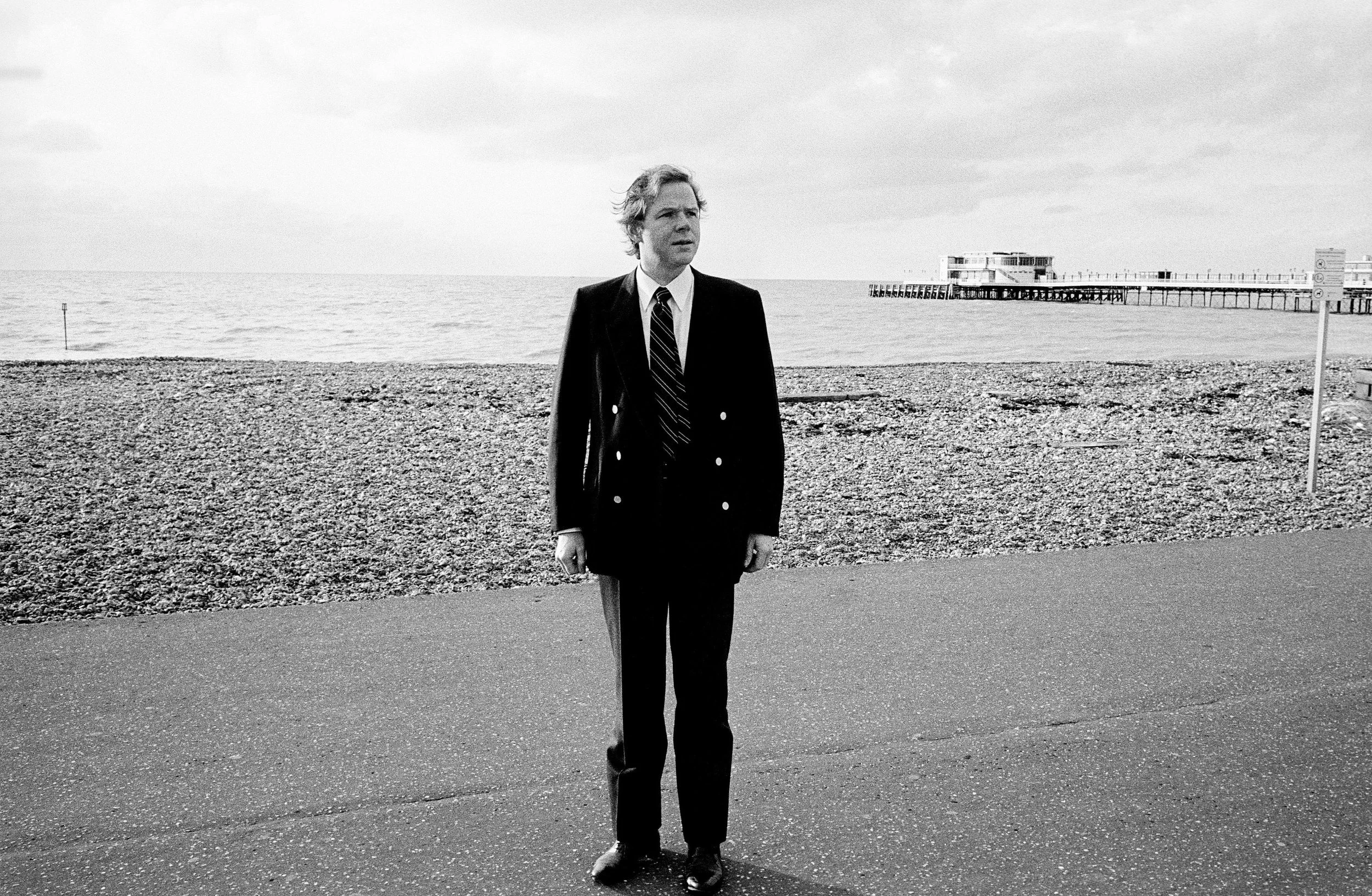 DR. JULIAN BOON, ‘THE REAL CRACKER', ON WORTHING BEACH DR. BOON, FROM THE MILLS AND BOON DYNASTY—THE FAMOUS PUBLISHERS OF BODICE-RIPPING ROMANCES—AND FOND OF BLAZERS AND STRAW BOATERS, TEACHES PSYCHOLOGY AT LEICESTER UNIVERSITY