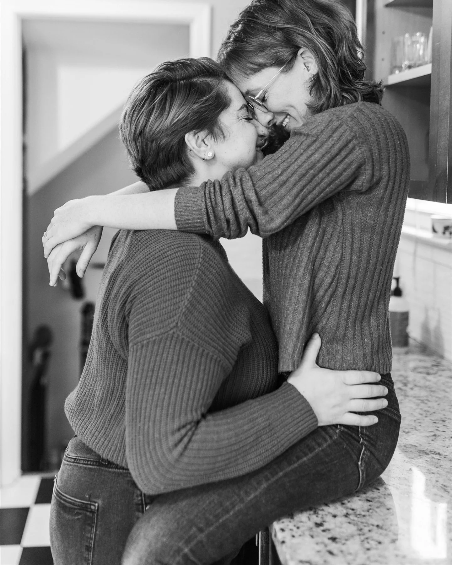 Earlier this week I popped up to Detroit for Nicole &amp; Rachel&rsquo;s engagement session. I loved spending the day with them in their home, snuggling their pets, bopping around their neighborhood, and grabbing drinks at the bar where they had thei