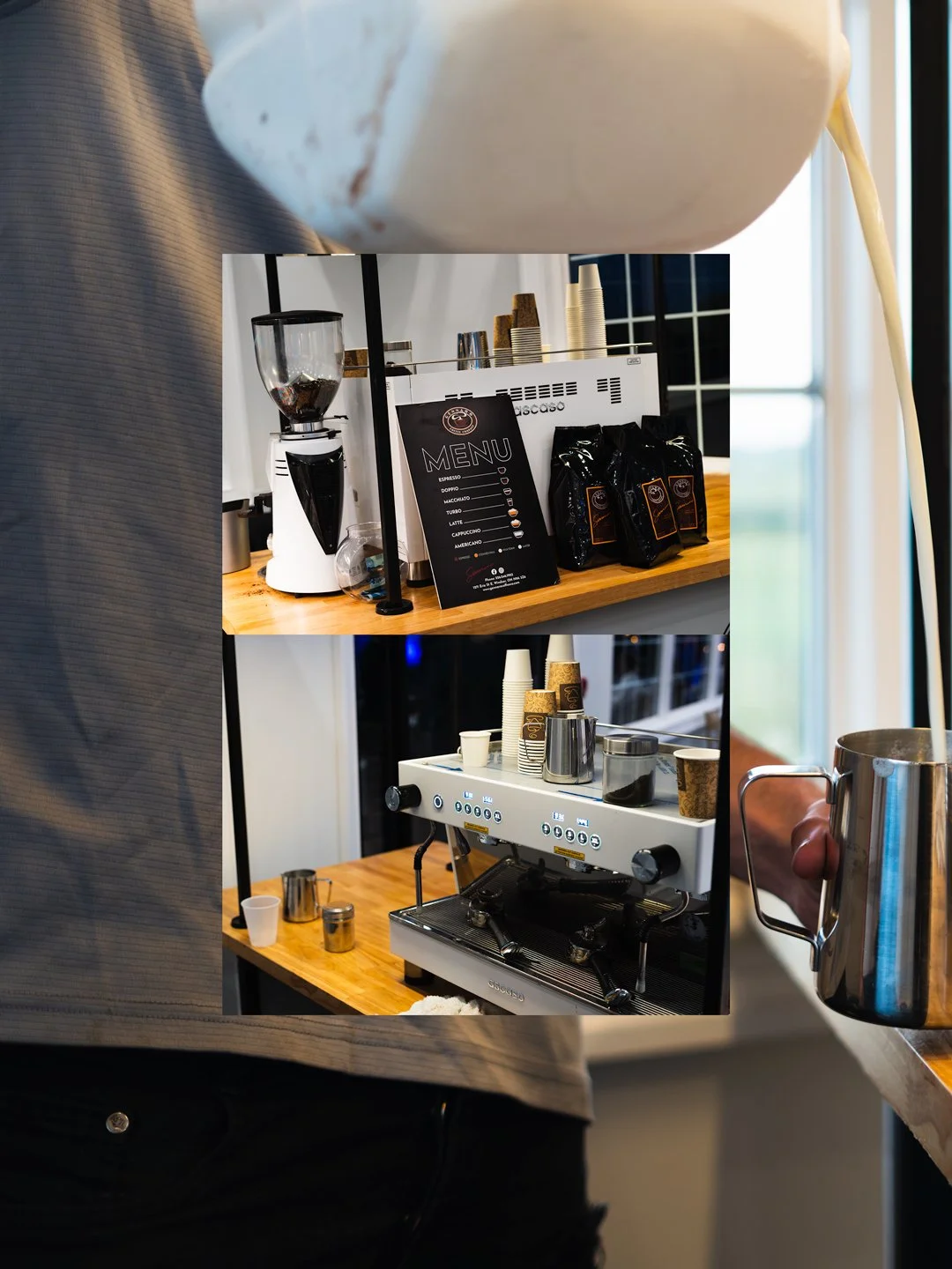 A coffee station with a grinder, espresso machine, and cups, set on a wooden counter in a cafe.