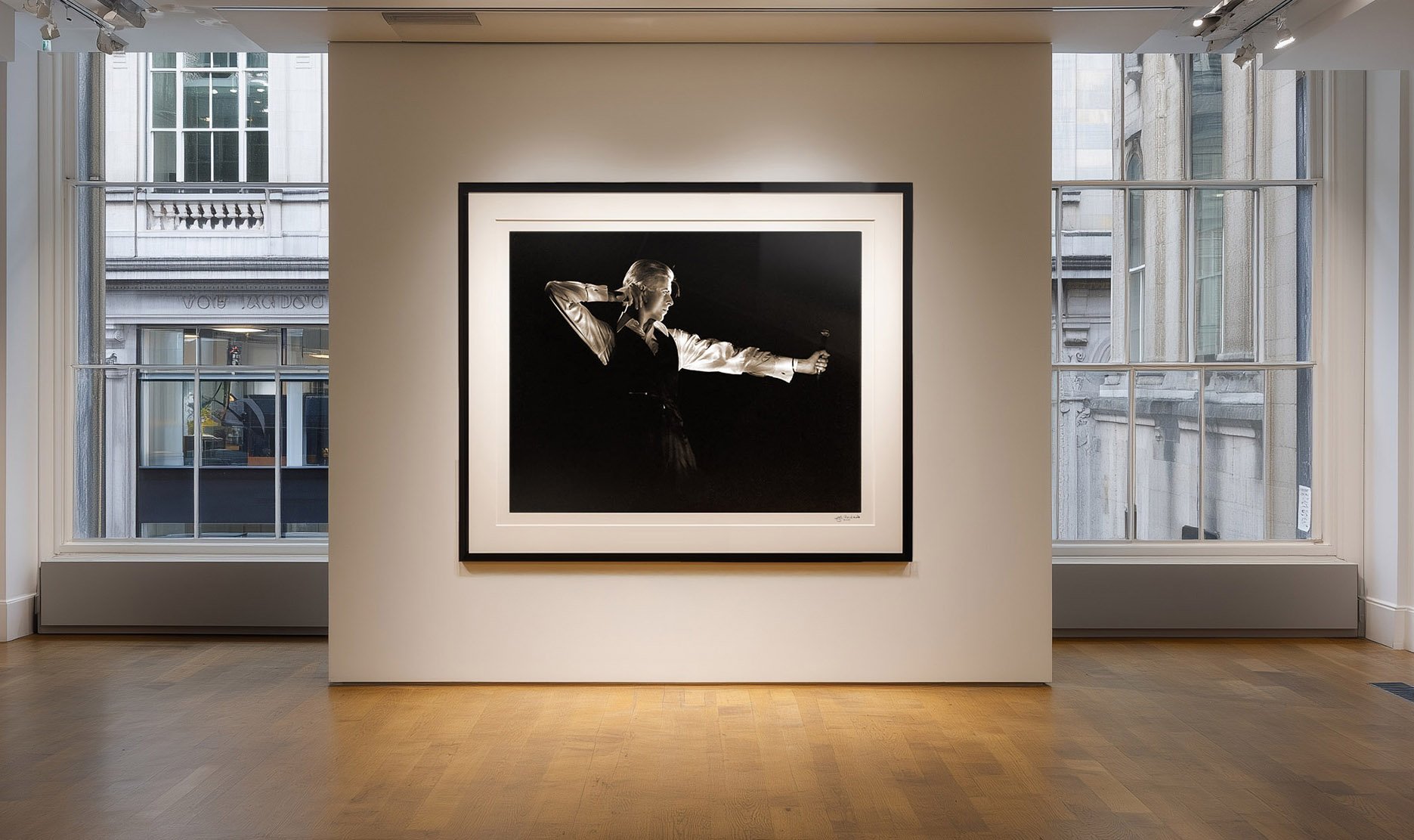 "An exhibition view of the John Rowlands Archive David Bowie 'Archer' print, showcasing the uncropped full-frame limited edition in a professional gallery setting.