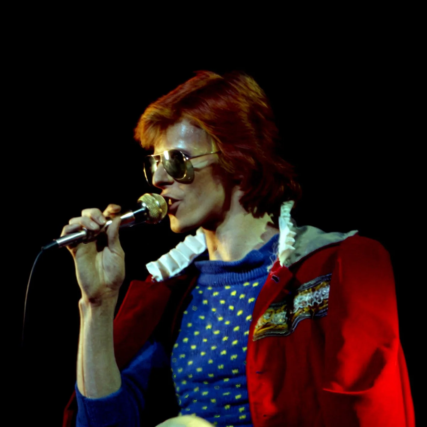 David Bowie holding skull during Cracked Actor by John Rowlands. O'Keefe Centre, Toronto, 1974. Diamond Dogs tour theatrical ritual on stage.