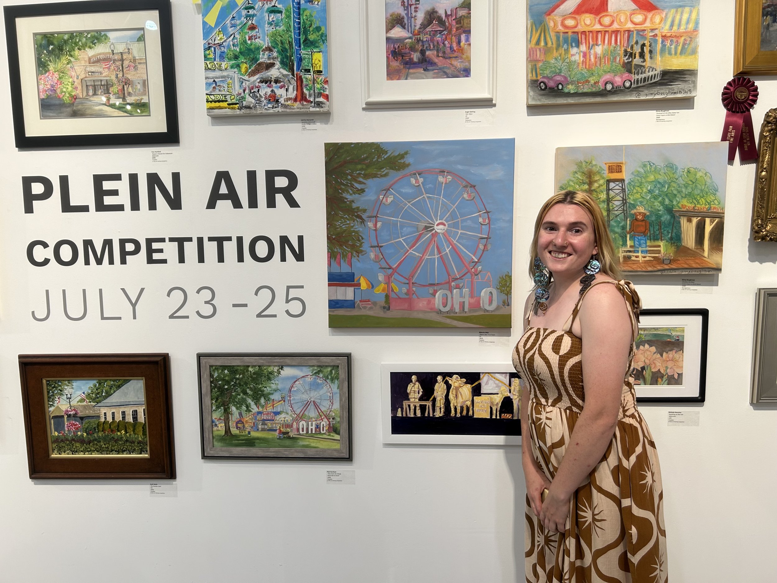 Makaila Weir and their art at the Ohio State Fair Plein Air Competition