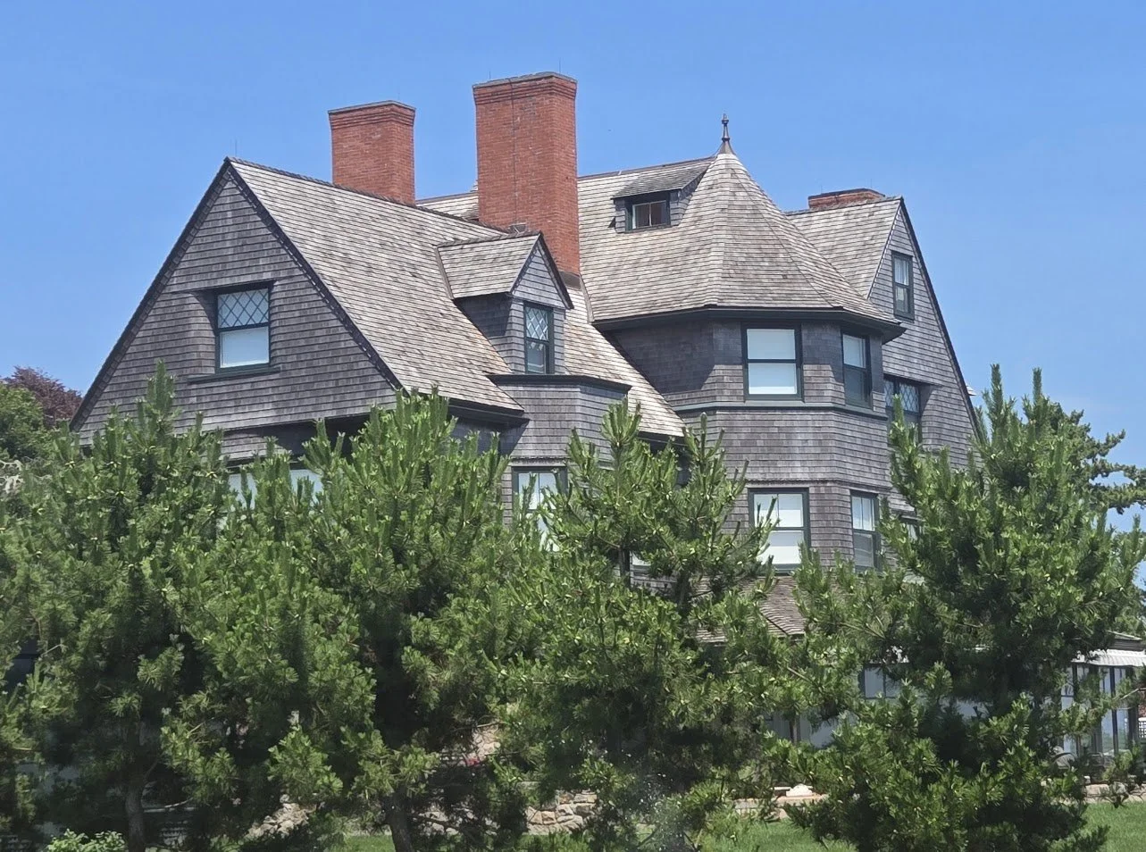 Historic residence with cedar wood roof and finial by custom copper co., in newport, rhode island