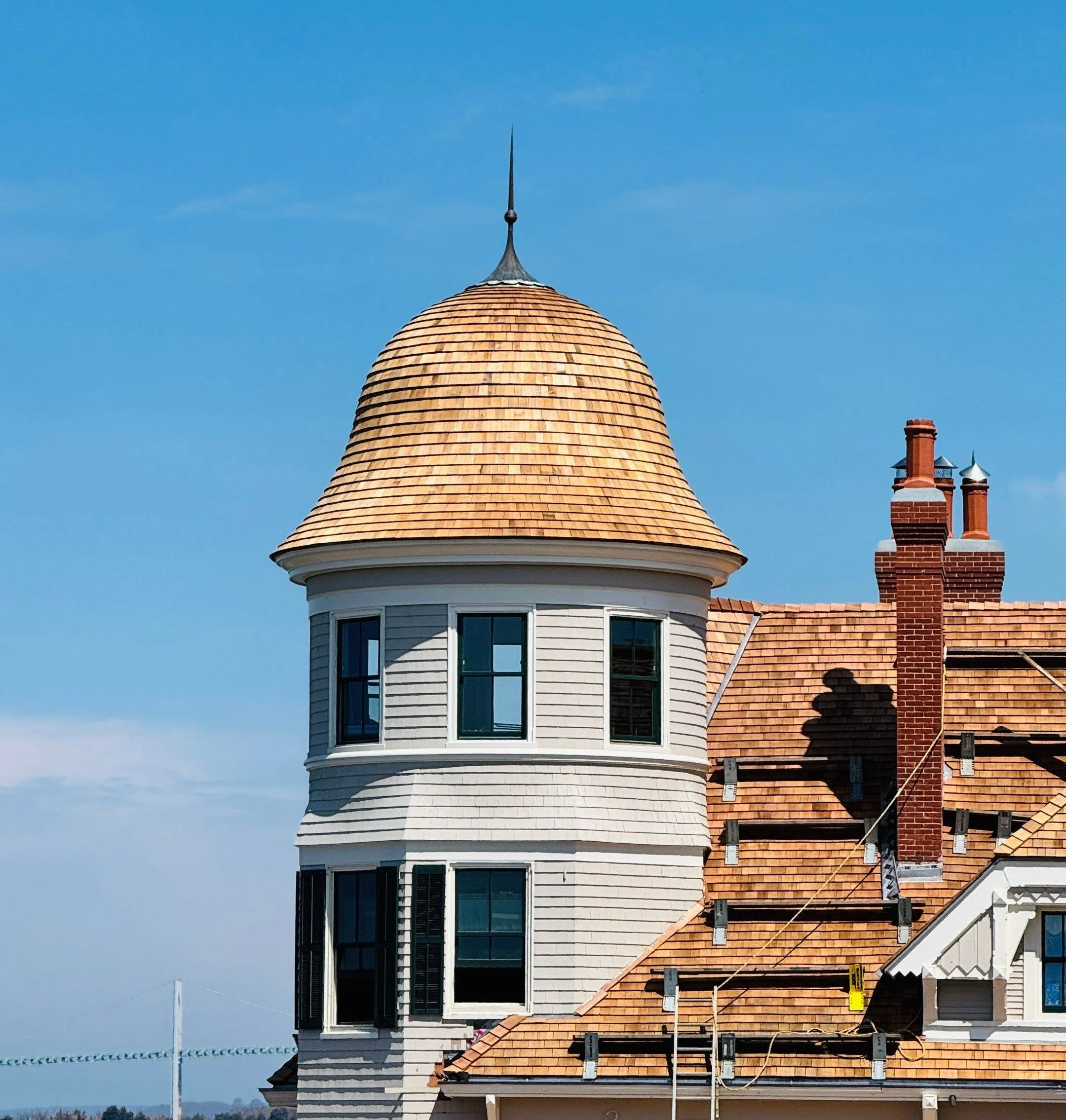 Finial and cedar wood roof historic restoration at Castle Hill Inn by Custom Copper Co., in Newport, Rhod Island