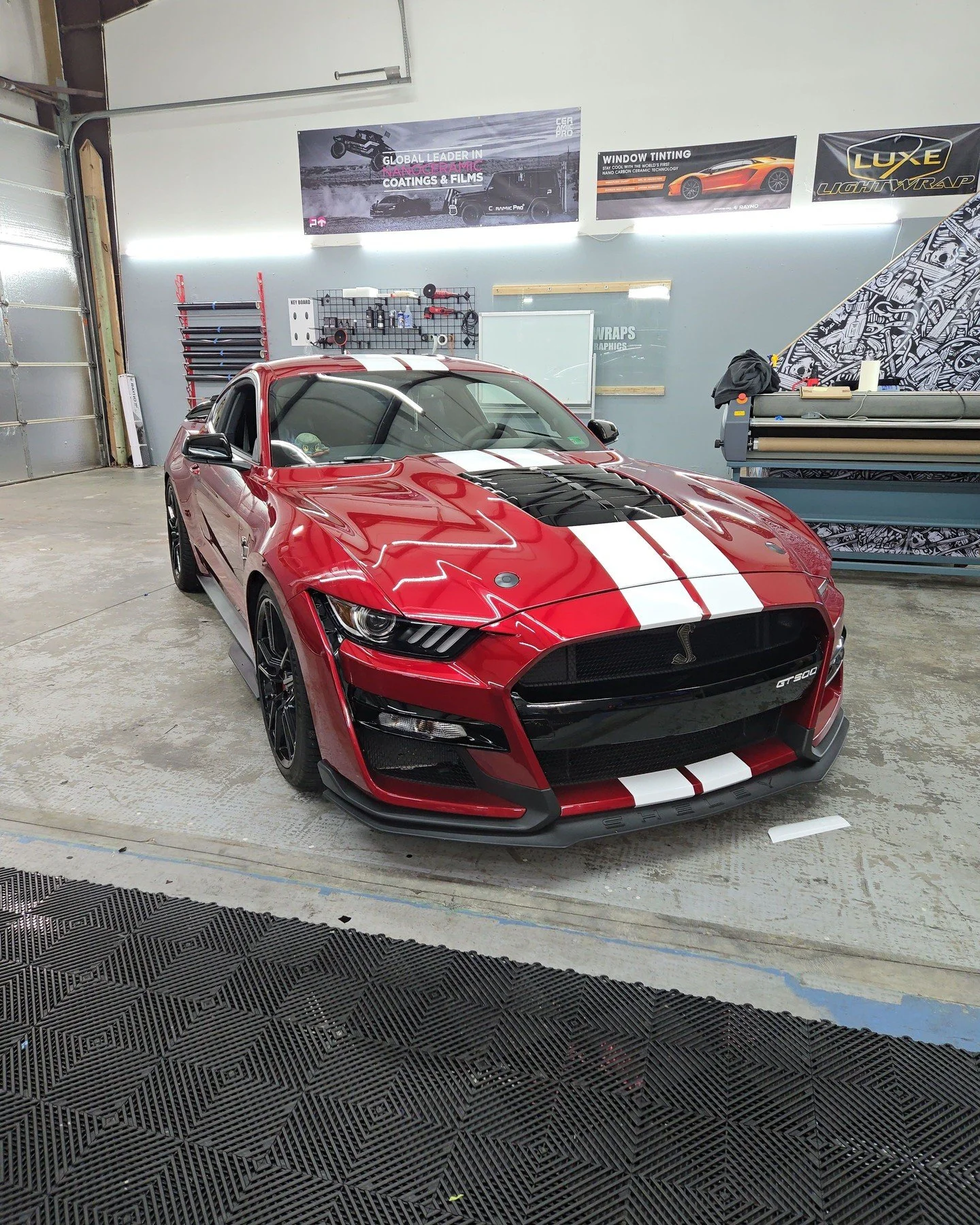 Nothing says performance like a bold racing stripe on a Shelby GT500.
This factory-fresh red just got an aggressive upgrade with custom white racing stripes that elevate the entire presence of this beast. Clean lines, precision install, and a finish 