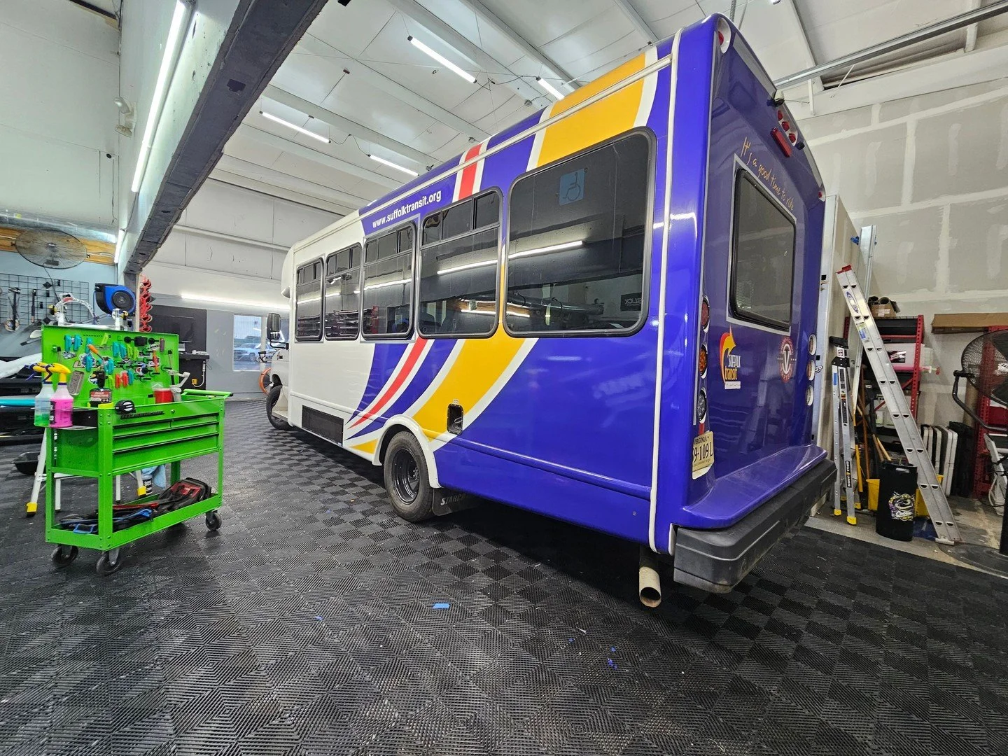 Damaged doesn&rsquo;t always mean replace everything.
This Suffolk transportation bus had damage on the driver side, and instead of re-wrapping the entire bus, we were able to print and install a new lower panel, restoring the look while saving time 