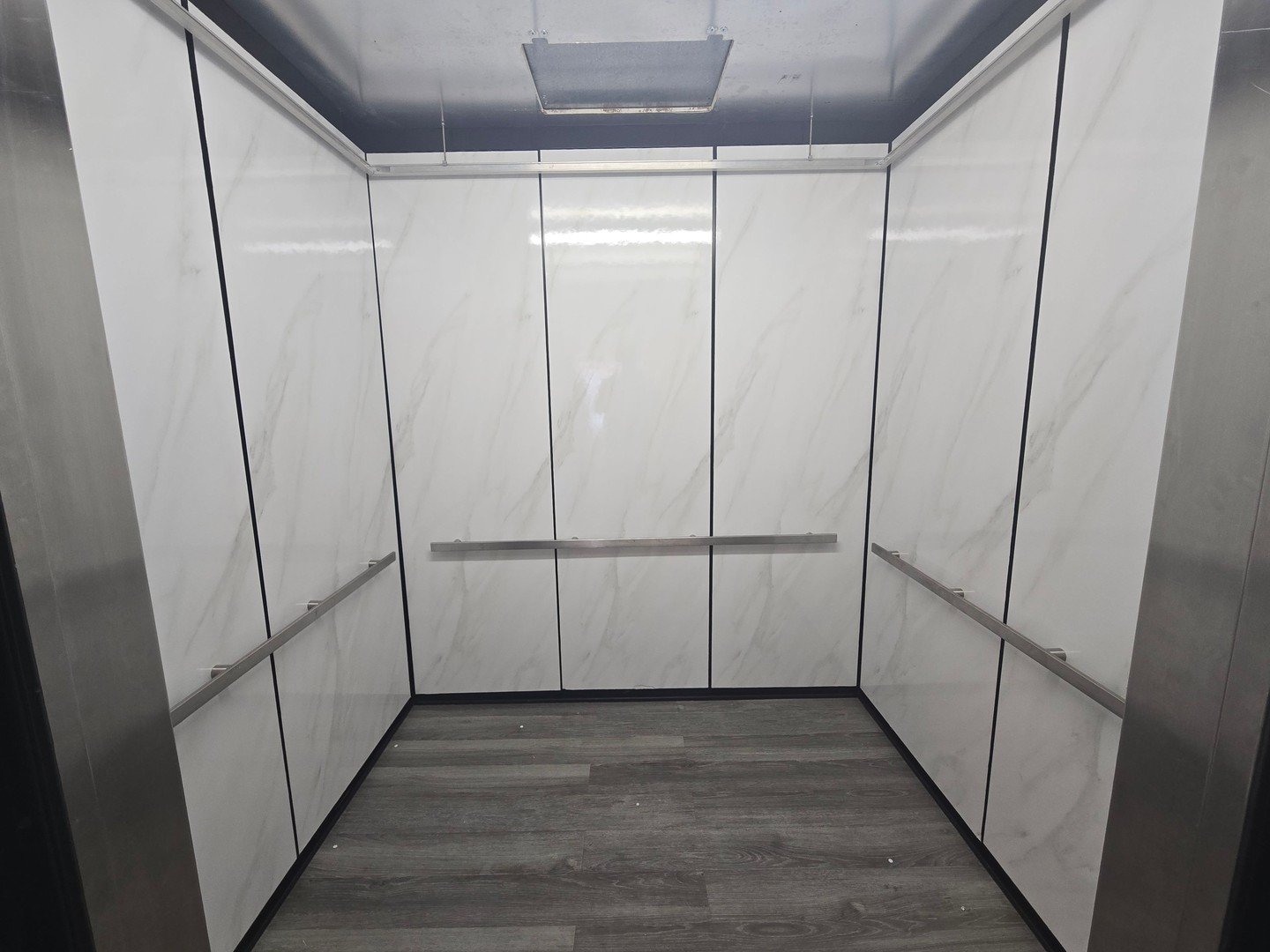 A simple upgrade can completely change the feel of a space.

These elevators at the church went from dated and plain to modern and impactful, with some gloss white marble, creating a more welcoming and engaging environment for everyone walking throug