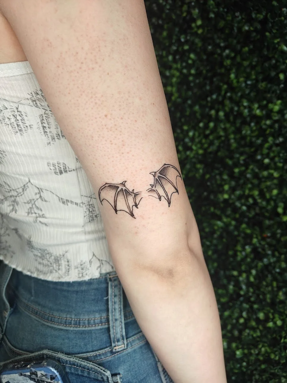 Jami-carry-on-wings-tattoo.jpg