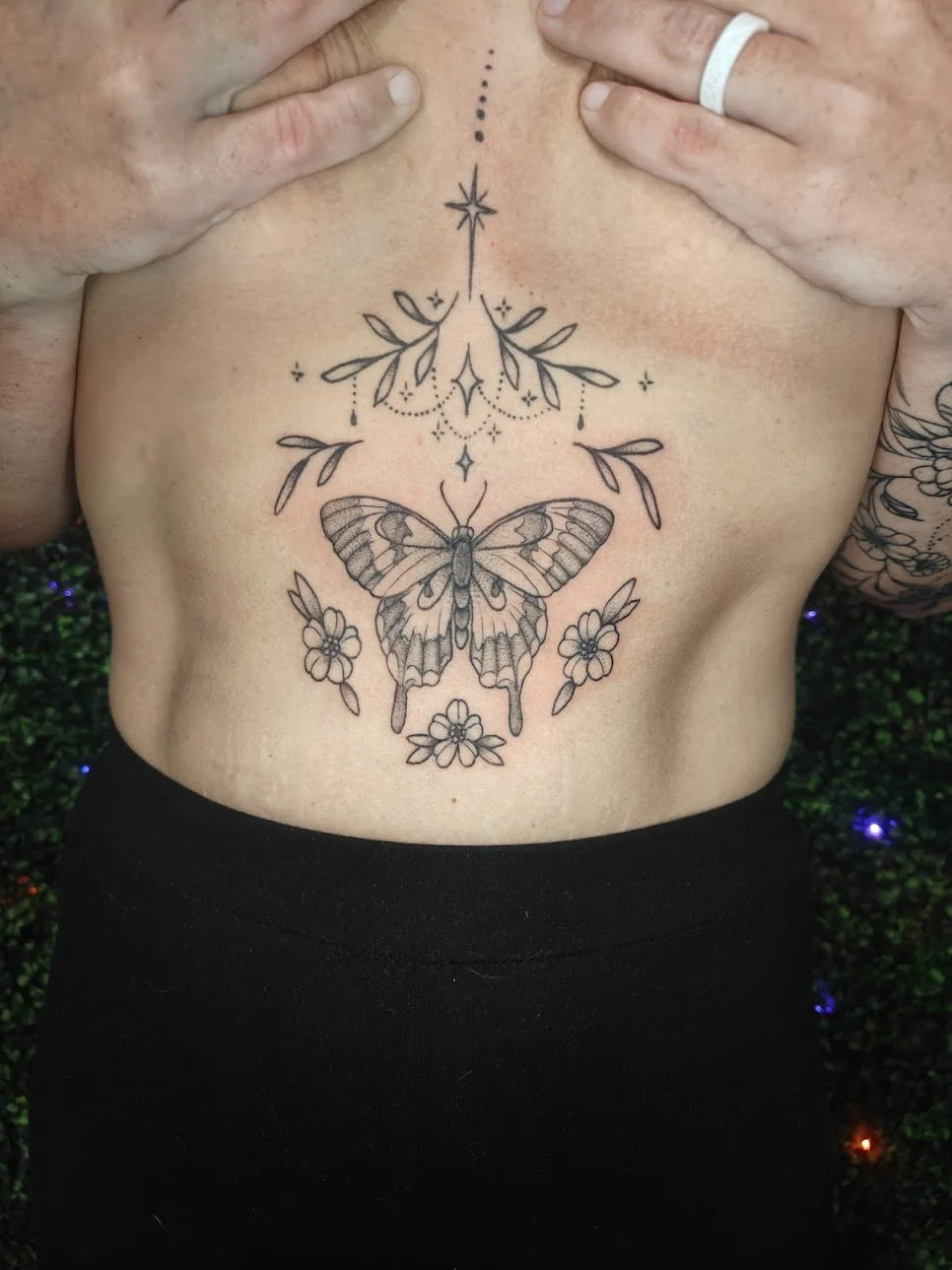 Jami-sternum-butterfly-tattoo.jpg
