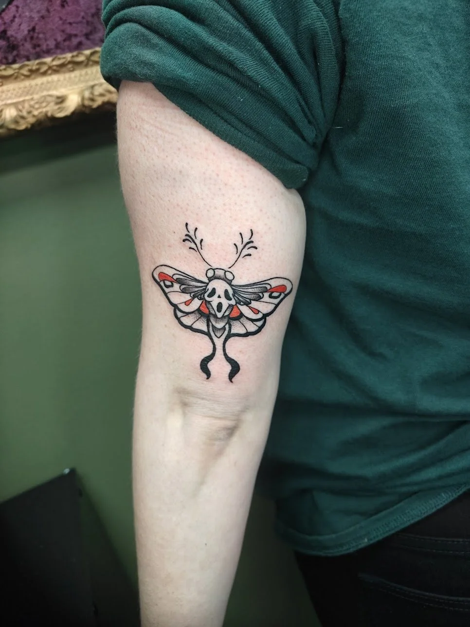 Jami-ghostface-moth-flash-tattoo.jpg