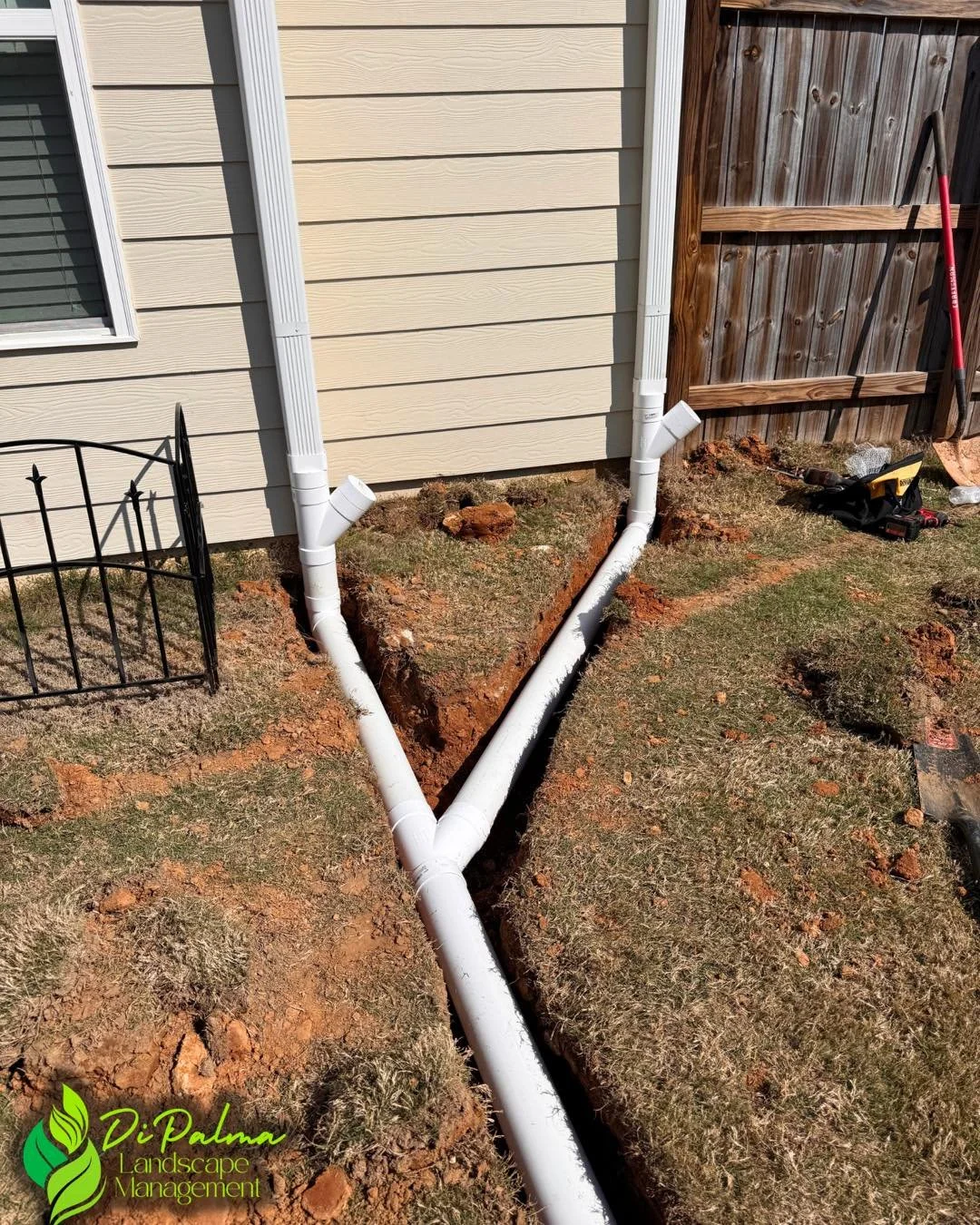 💧🏡 Standing water near the foundation was caused by downspout runoff. We installed downspout extensions with pop-up emitters, directing water into the existing dry creek bed for proper drainage. 🌿

Contact us today for your free quote:
☎️770-370-1