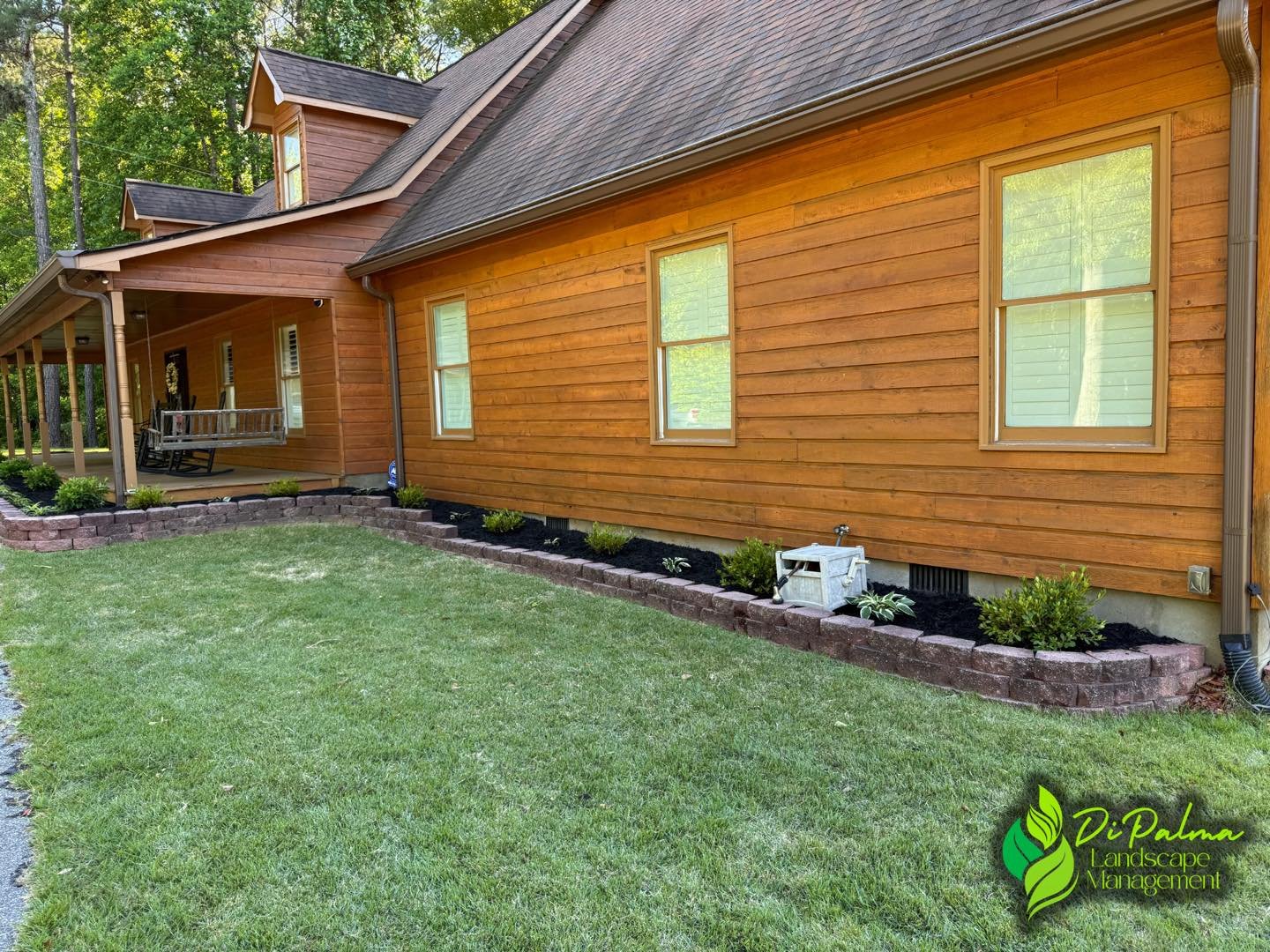 Clean and simple landscape upgrade 🌿 We changed these beds from red mulch to fresh black mulch and added new hostas, azaleas, Little Lime hydrangeas, and variegated liriope to give this home a clean, updated look ✨

Ready to upgrade your landscape? 