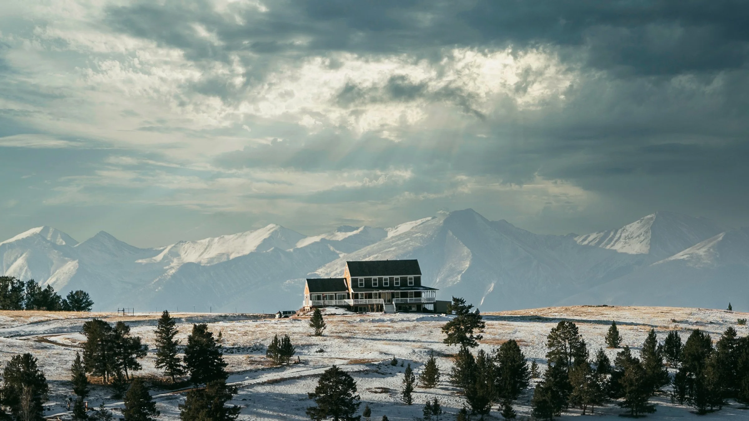 Luxury real estate photography exterior shot of a mountain home near Fort Carson and Colorado Springs in winter.