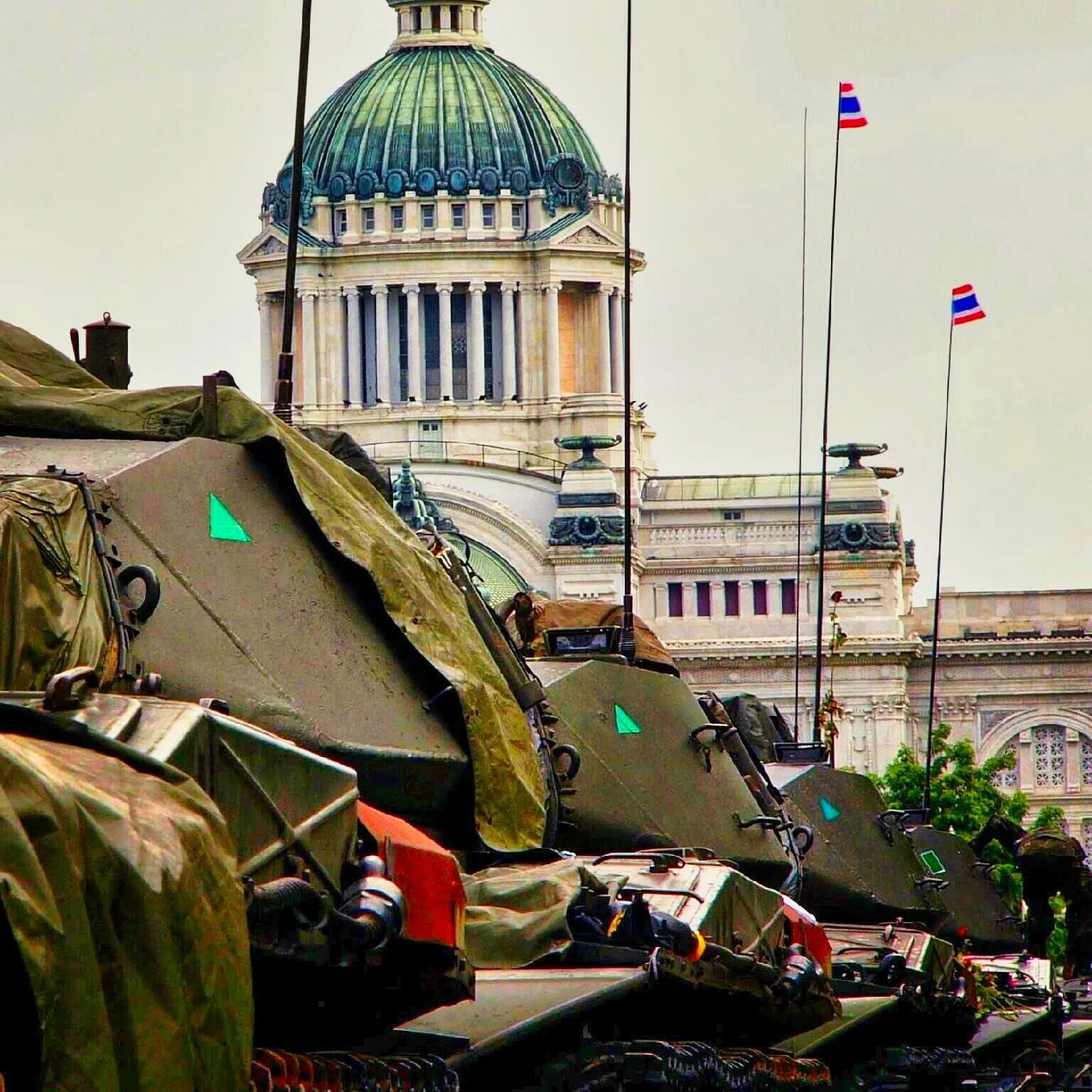 A striking contrast of power & beauty at the Royal Plaza - The historic Ananta Samakhom Throne Hall with a modern military presence - Bangkok, Thailand