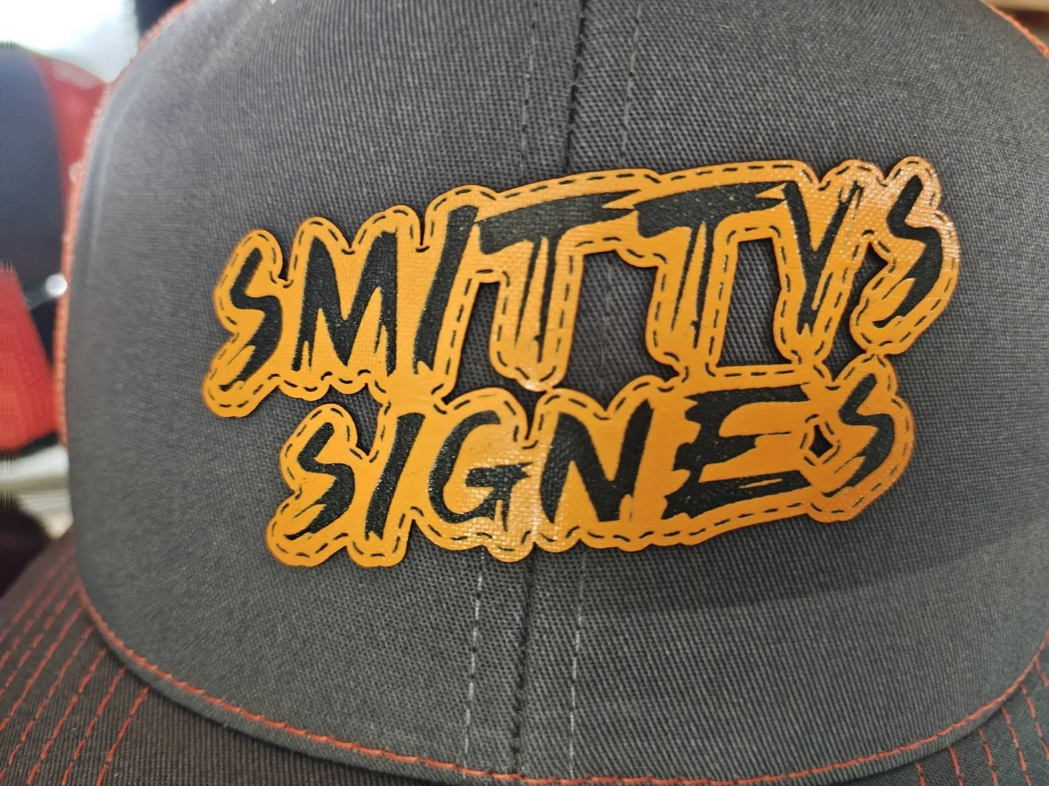Smitty's Signes Custom Laser cut laser etched design Hat